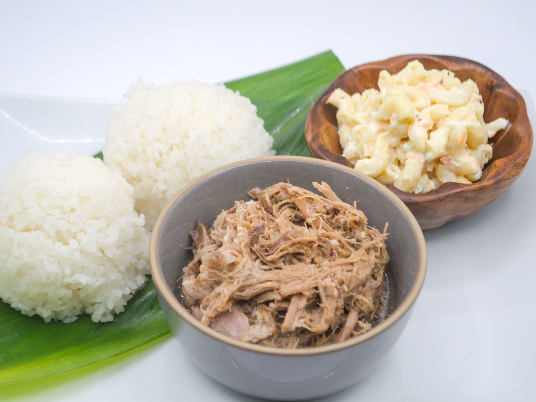 #4 Kalua Pig & Macaroni Salad from Yama's Fish Market — Smoky, slow-roasted kalua pig — Hawaiian-style pulled pork — served with mac salad and white rice.