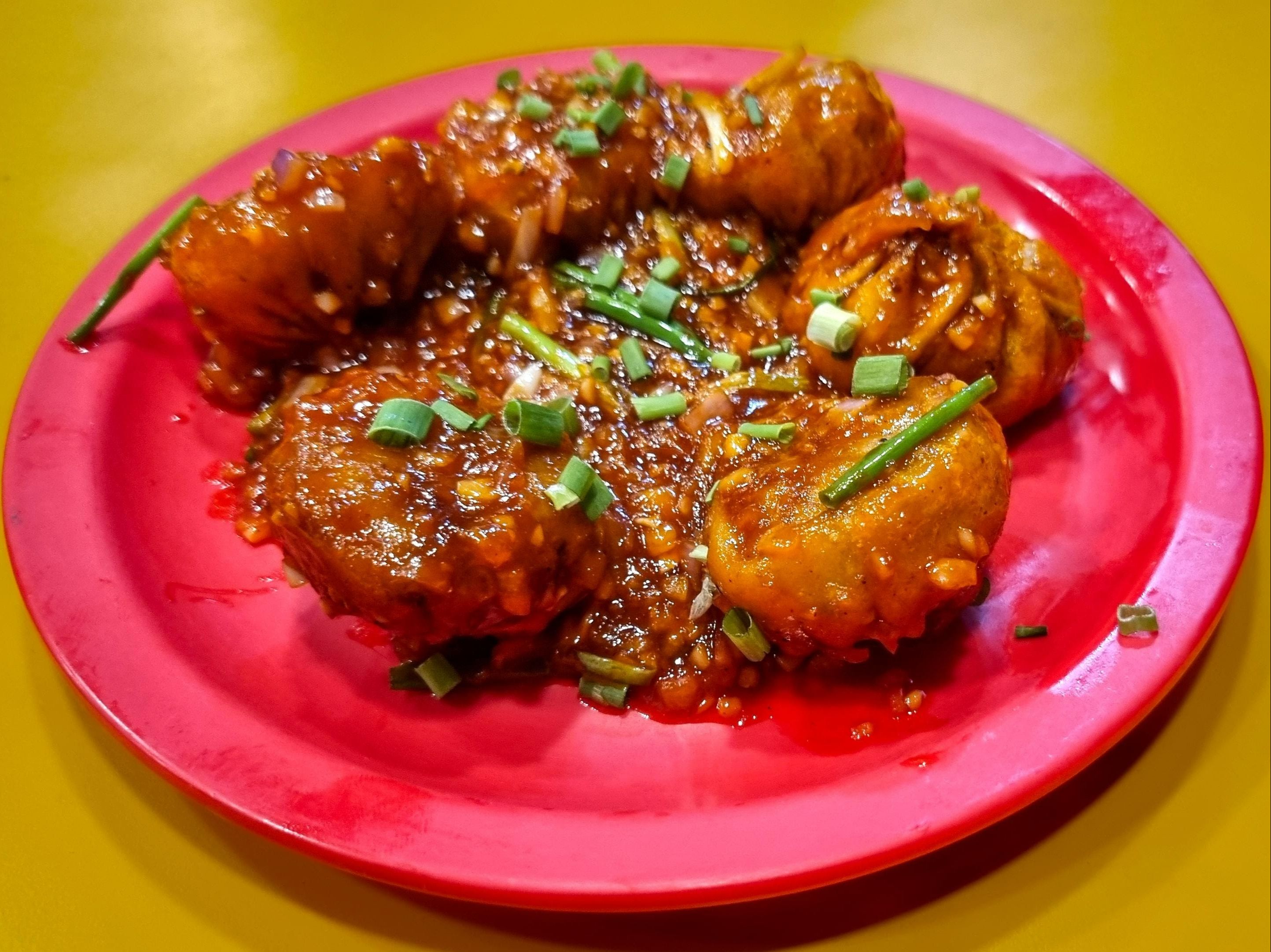 Schezwan Chicken Pan Fried Momo(6 Pc).