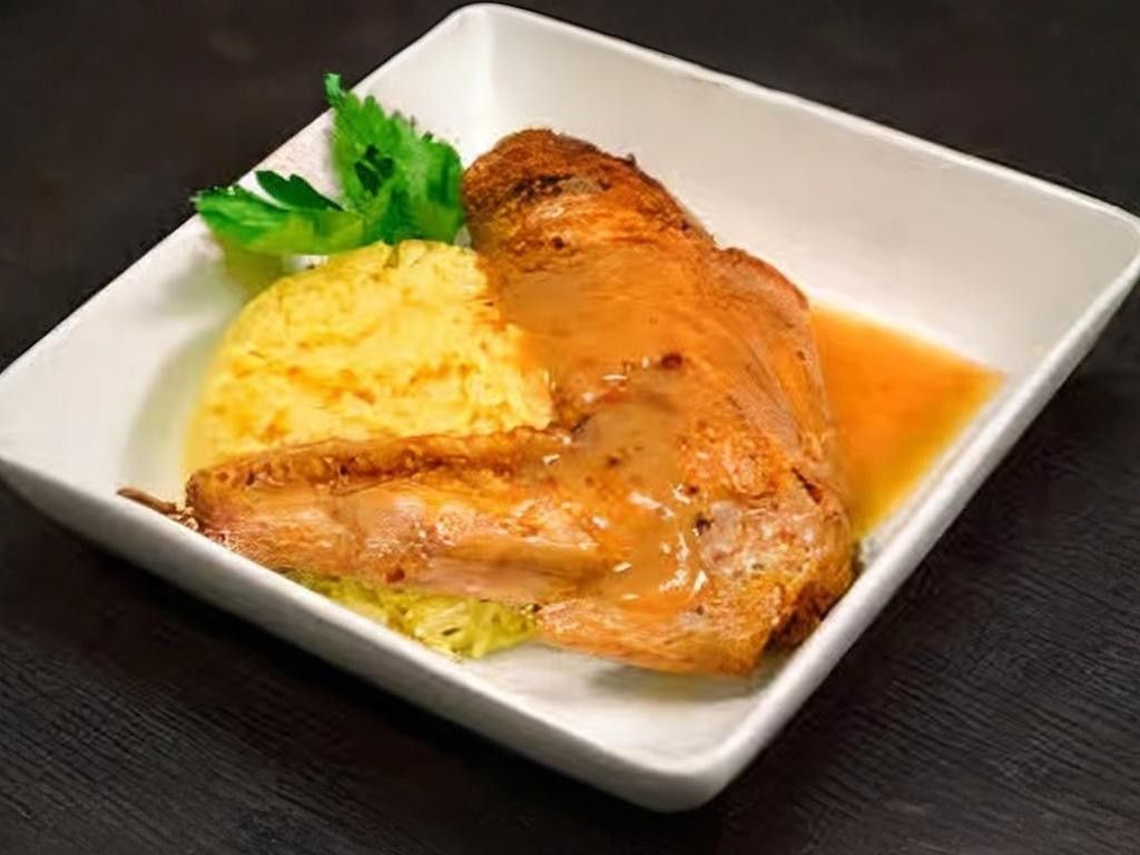Baked Turkey Wing over rice w/ gravy (No sides).