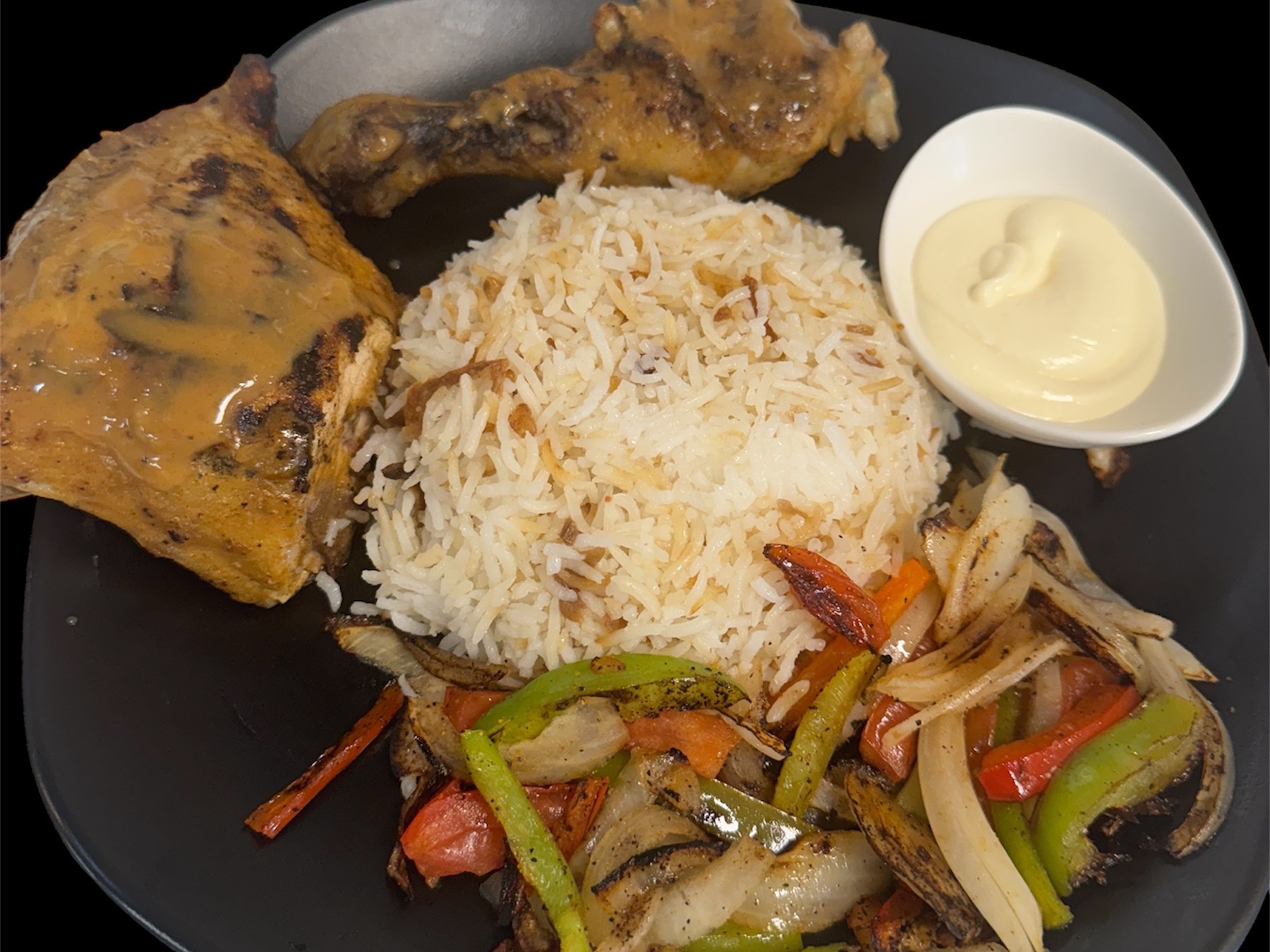 Grill Chicken Quarters with flavored basmati Rice & sautéed tomato, onion and pepper.