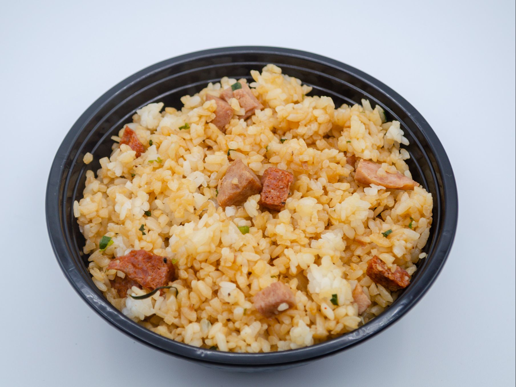 #22 Fried Rice from Yama's Fish Market — Local-style fried rice with green onions, eggs, and bits of Portuguese sausage and spam, seasoned with our in-house shoyu blend for a savory kick.