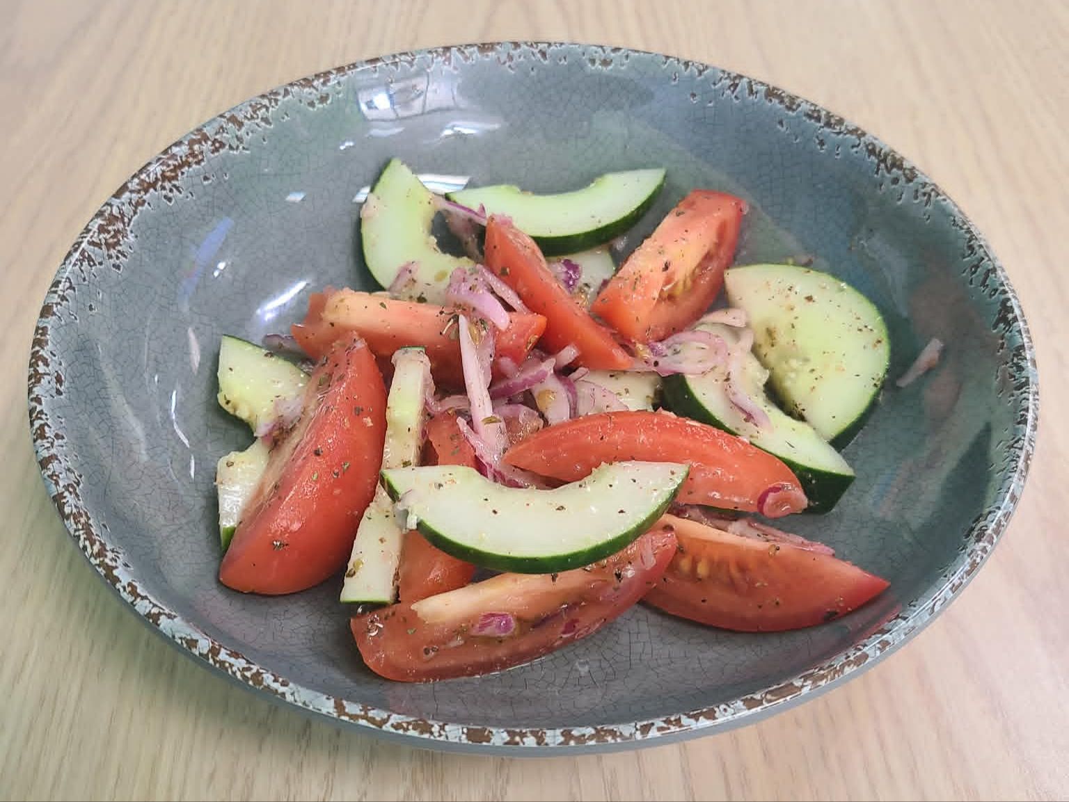 Tomato, Cucumber, & Onion Salad Side Salad Plate.