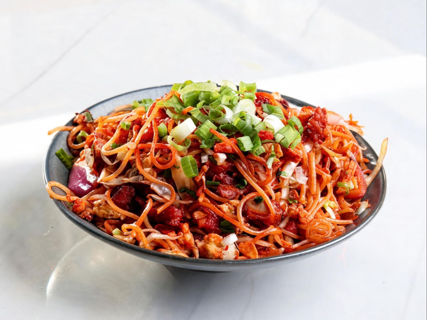 CHICKEN SCHEZWAN NOODLES.