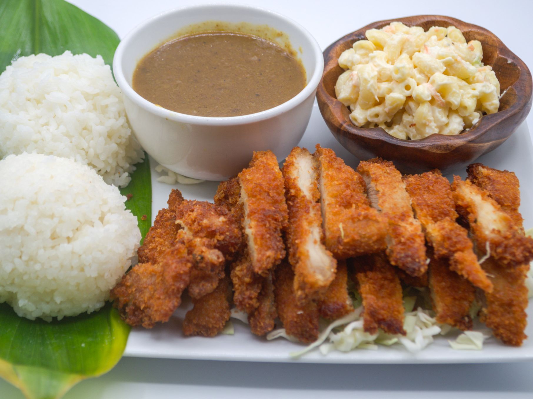 #24 Mochiko Chicken Curry from Yama's Fish Market — Crispy mochiko-battered chicken fried golden and topped with our smooth curry sauce. Served with white rice and mac salad
