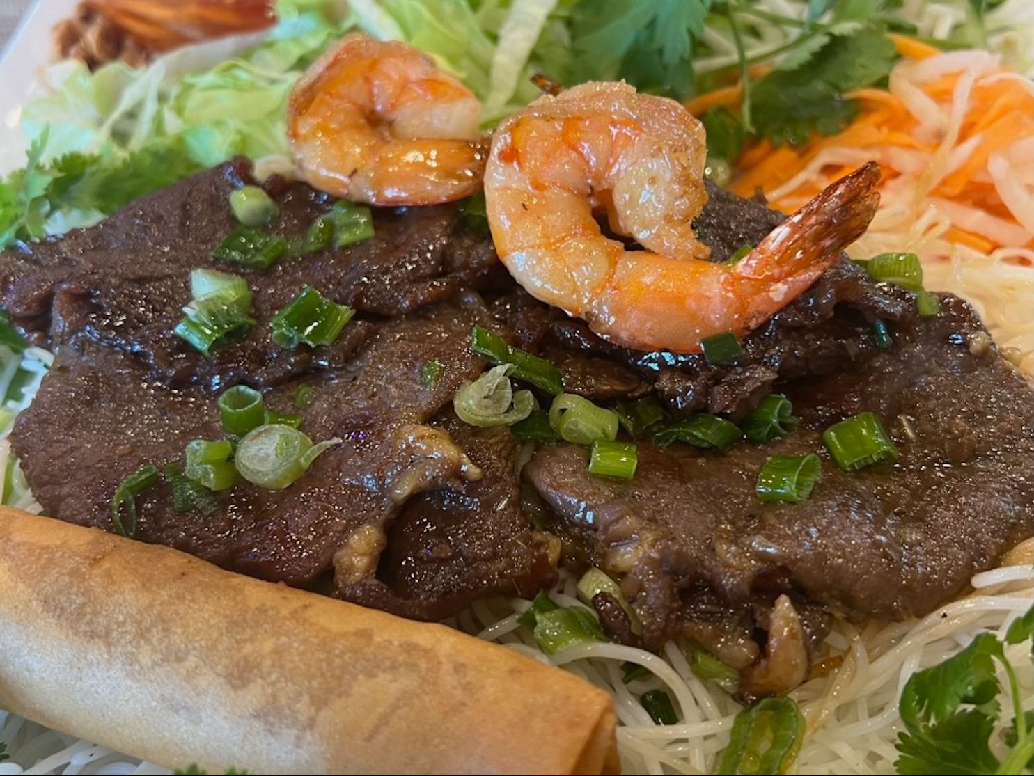B87. Grilled Beef, Shrimp, Egg Roll.