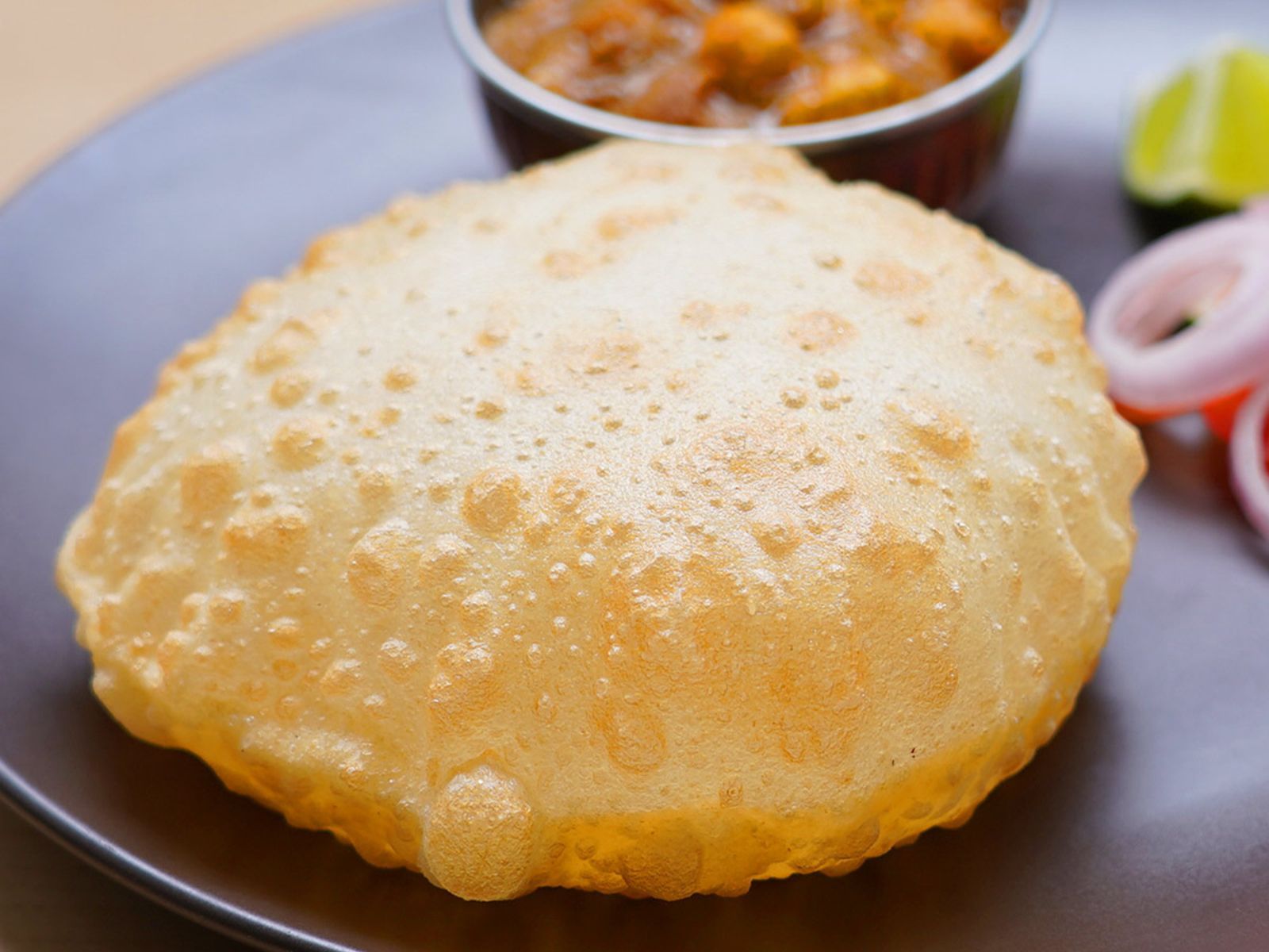 EXTRA BHATURA.