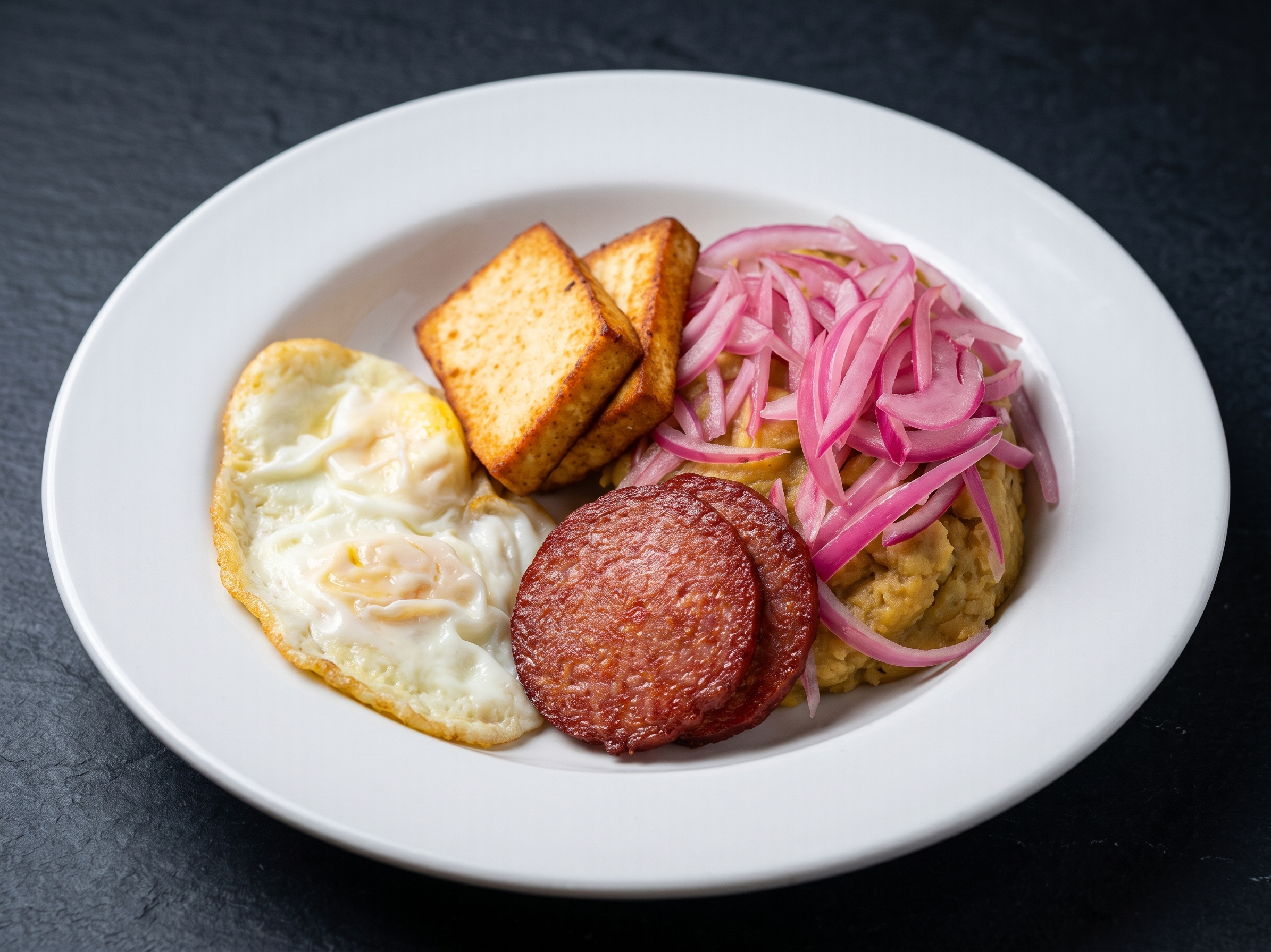 Mangu Tres Golpes.