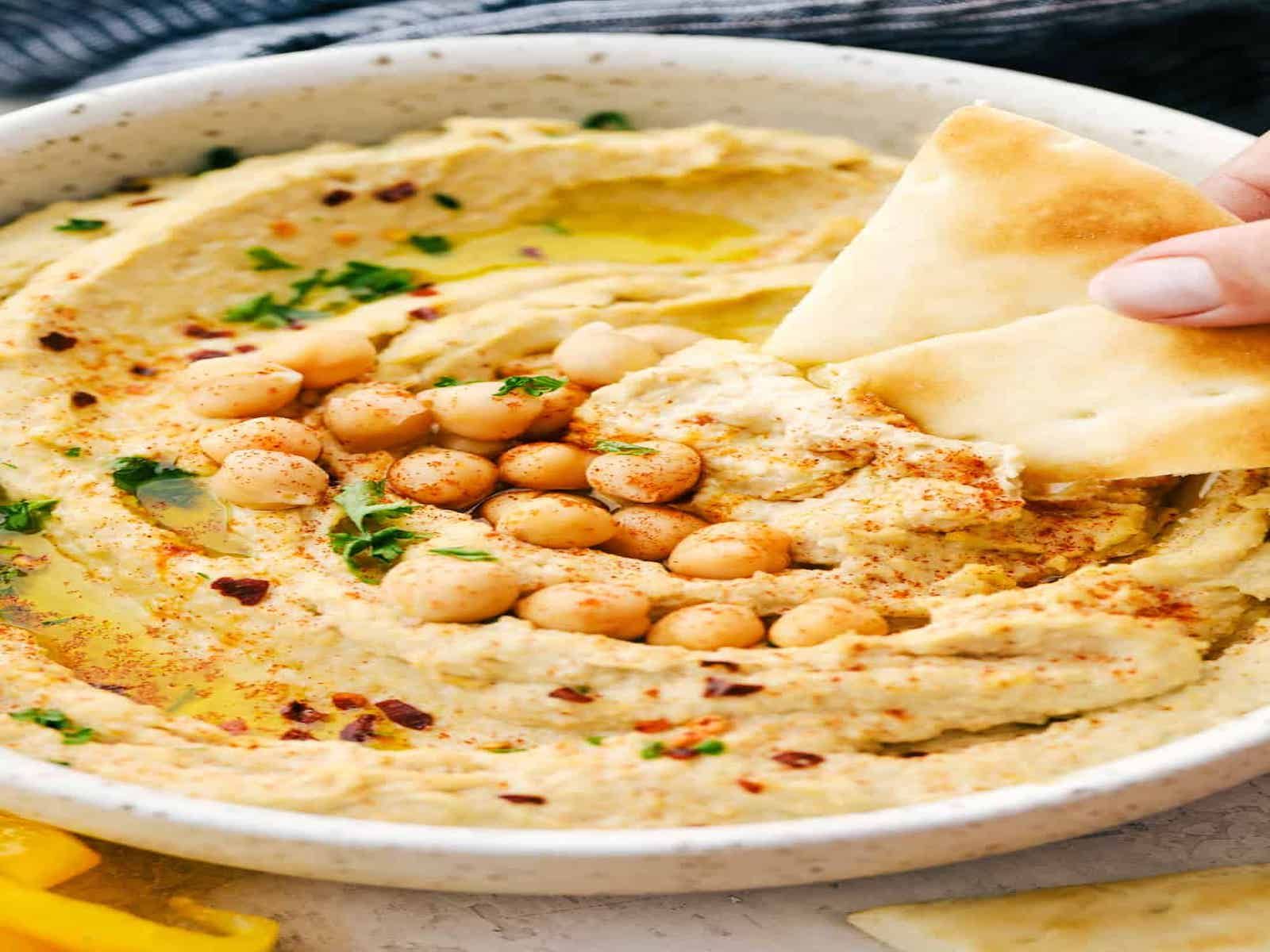 Classic Hummus + Pita Bread or Pita Chips.