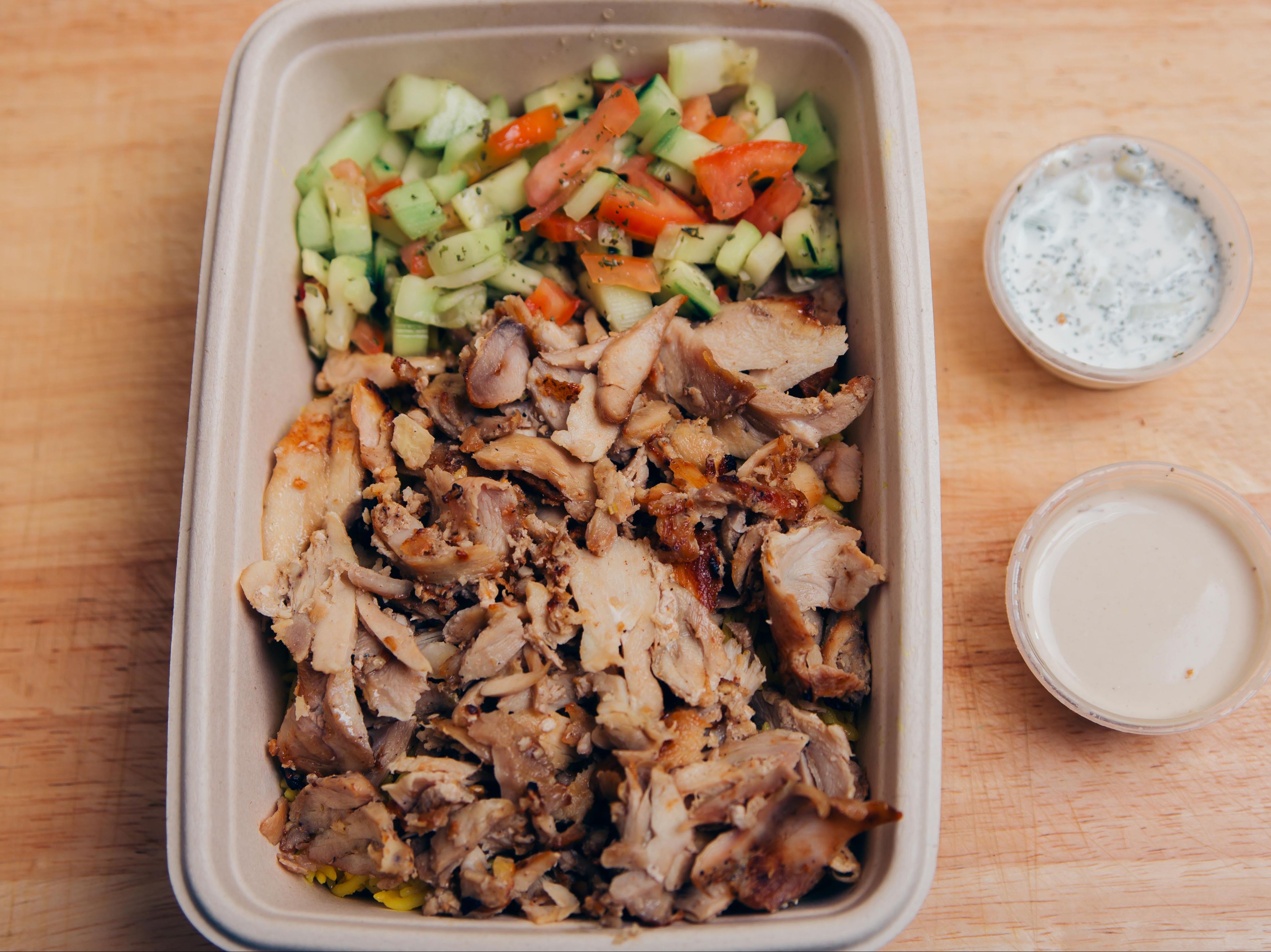 Chicken Shawarma Over Yellow Rice.