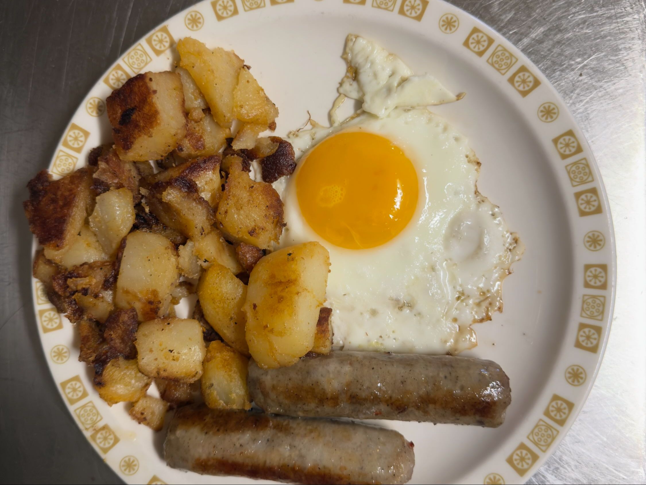 One Egg & Two Country Sausages, Home Fries & Toast.