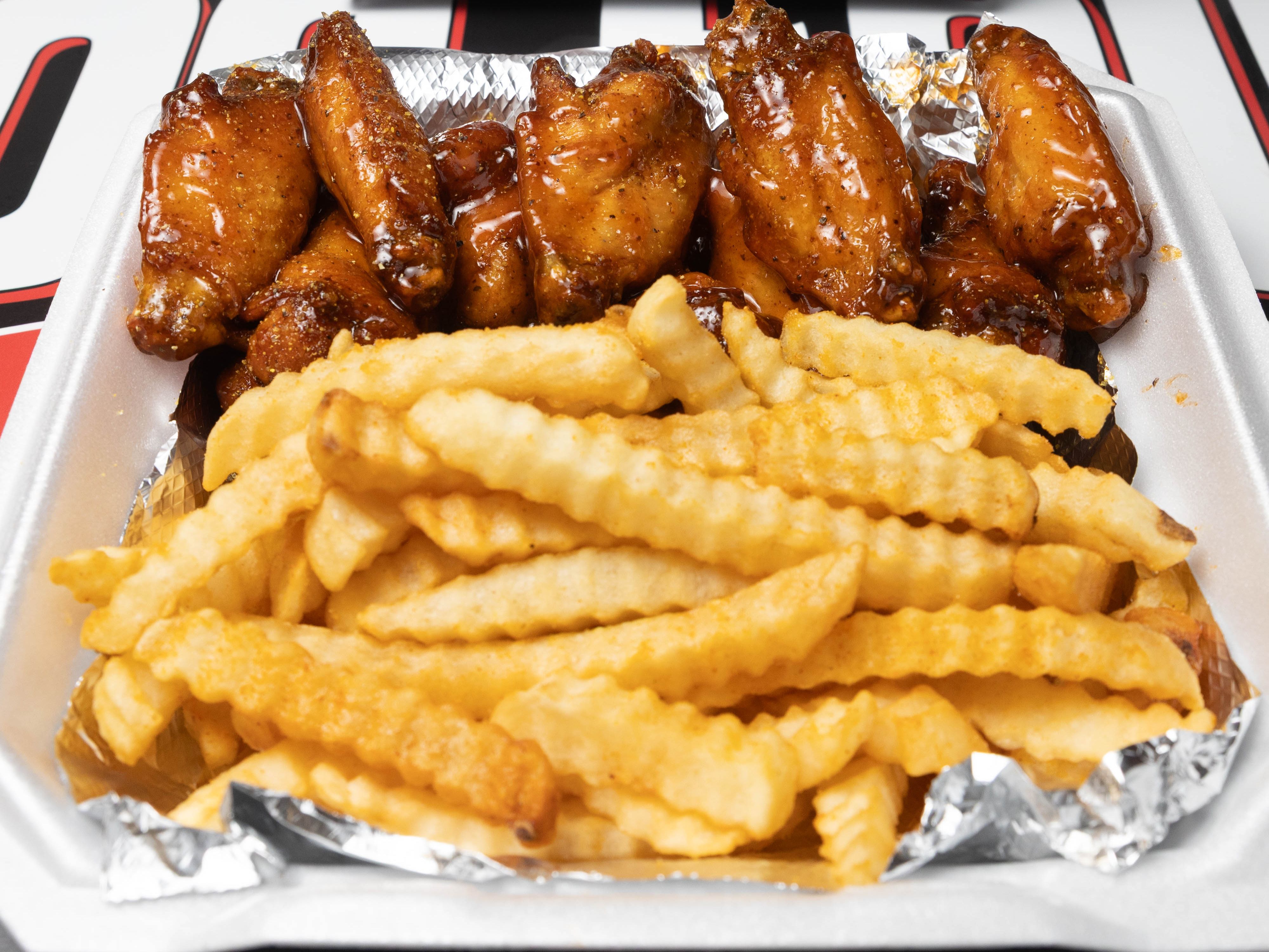 #5. Philly Cheese Steak, 5 Wings w/Fries and Drink.