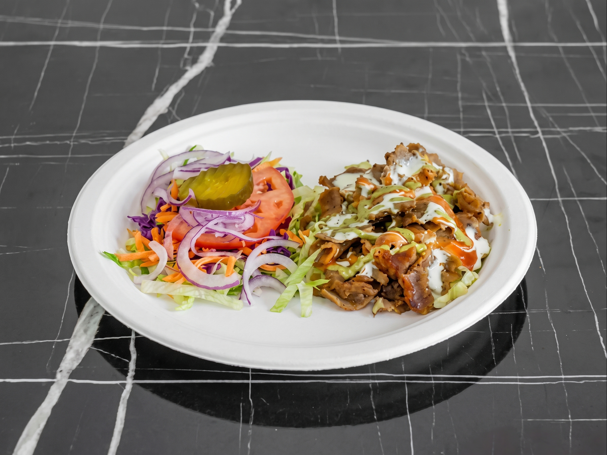 Kofte Over Rice or Fries.