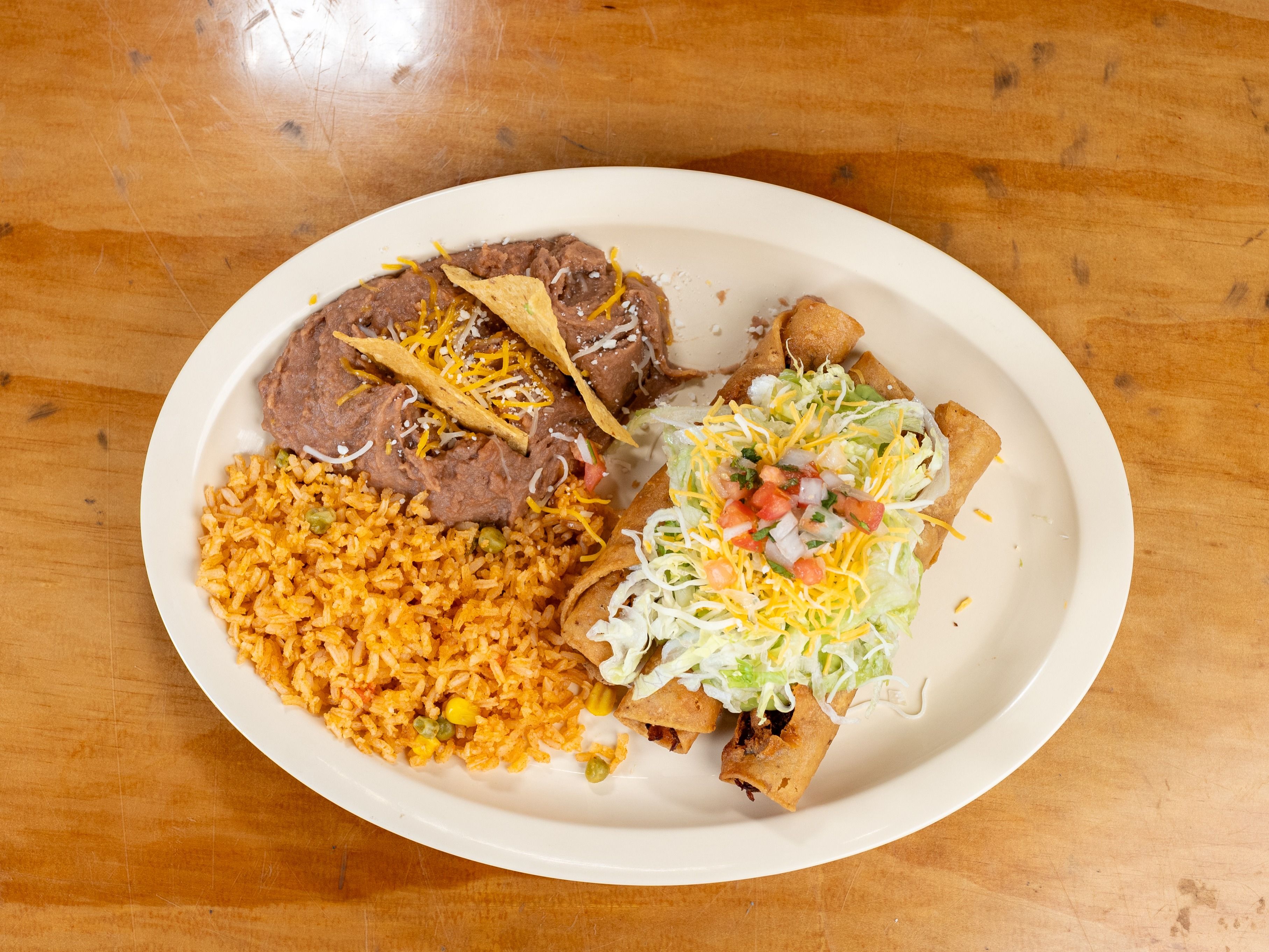 Spc#5 3 Rolled Tacos Combo.