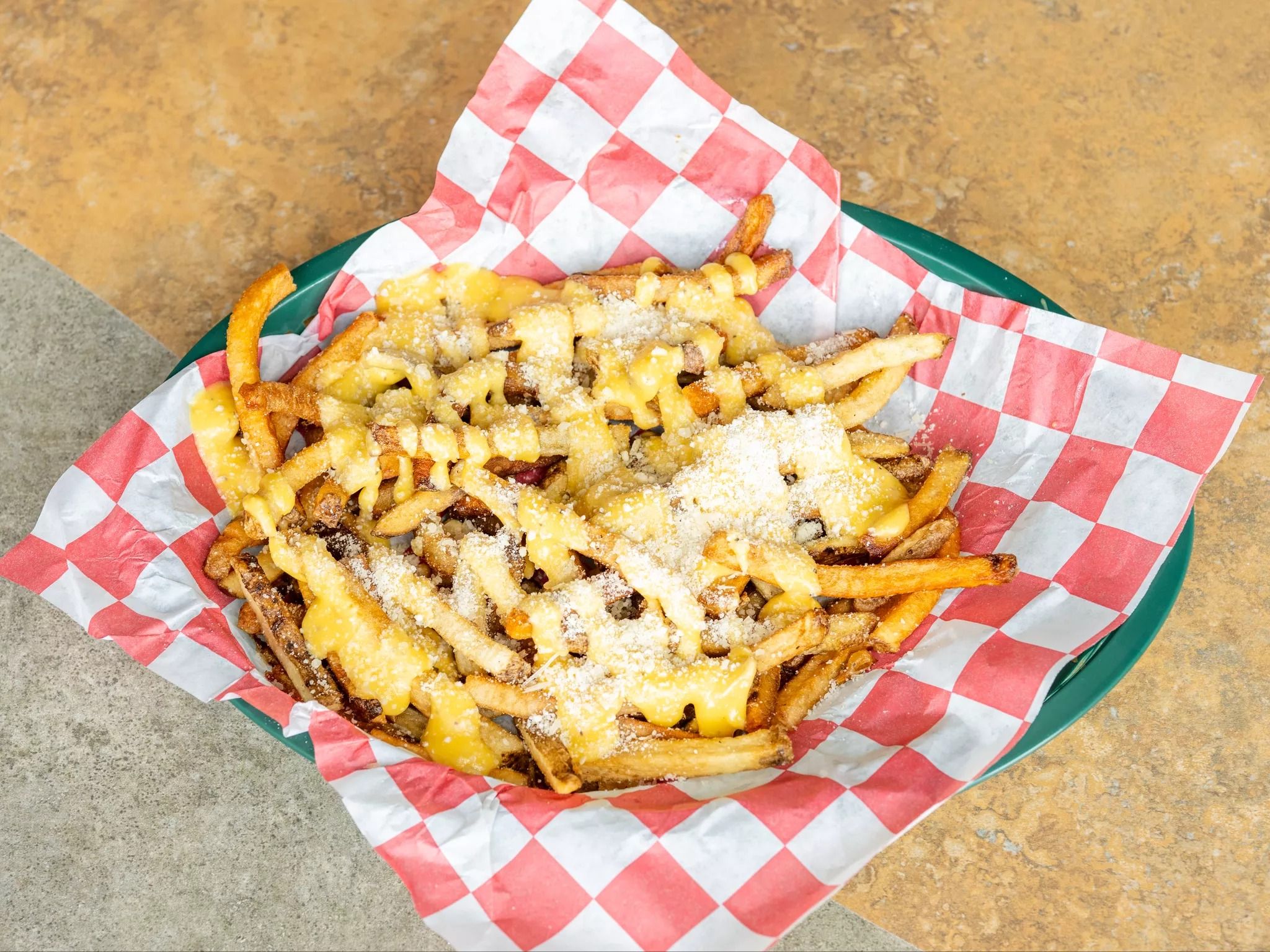 GARLIC PARMESAN FRIES.