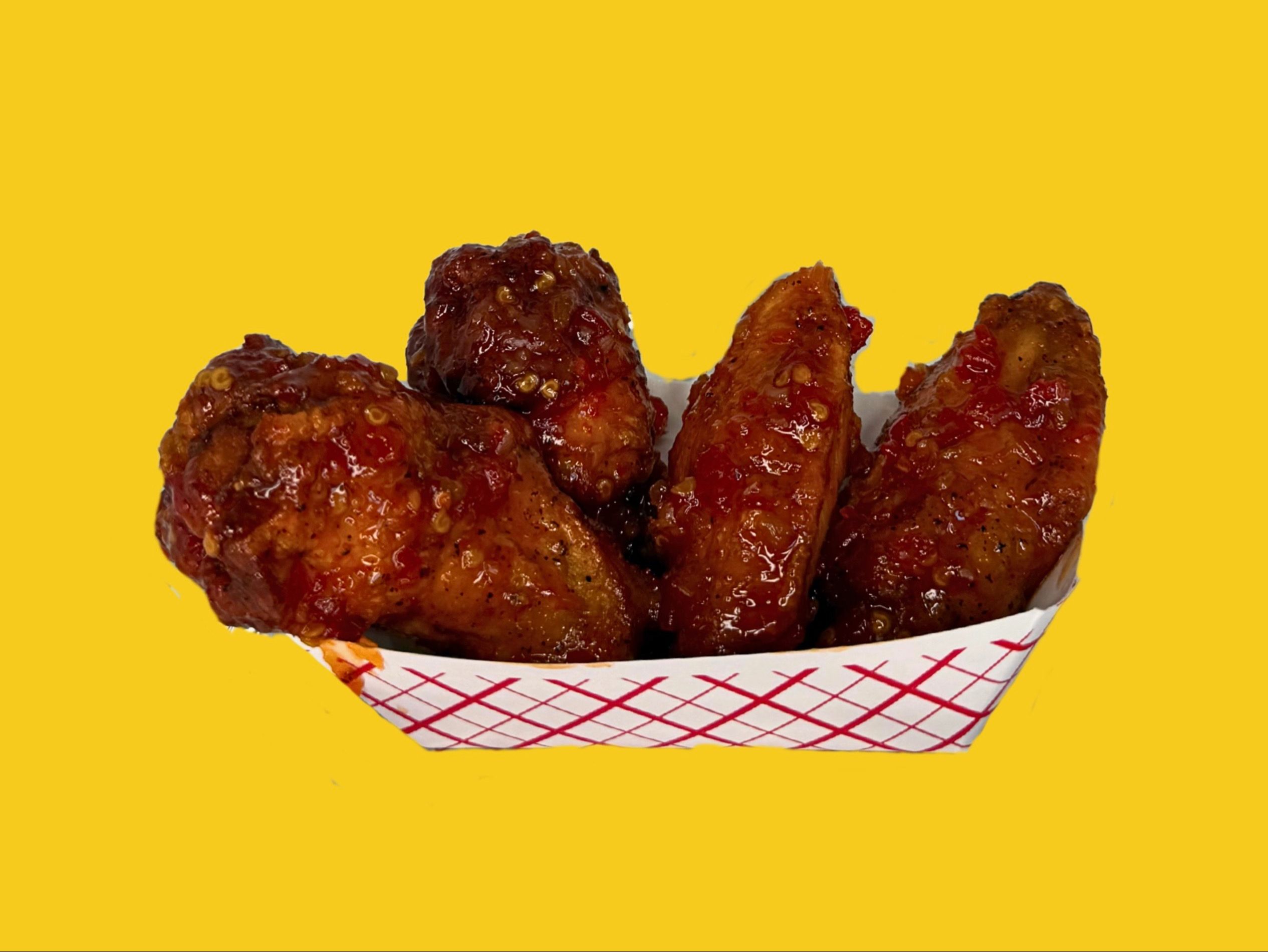 Mango Habanero wings (Dozen).