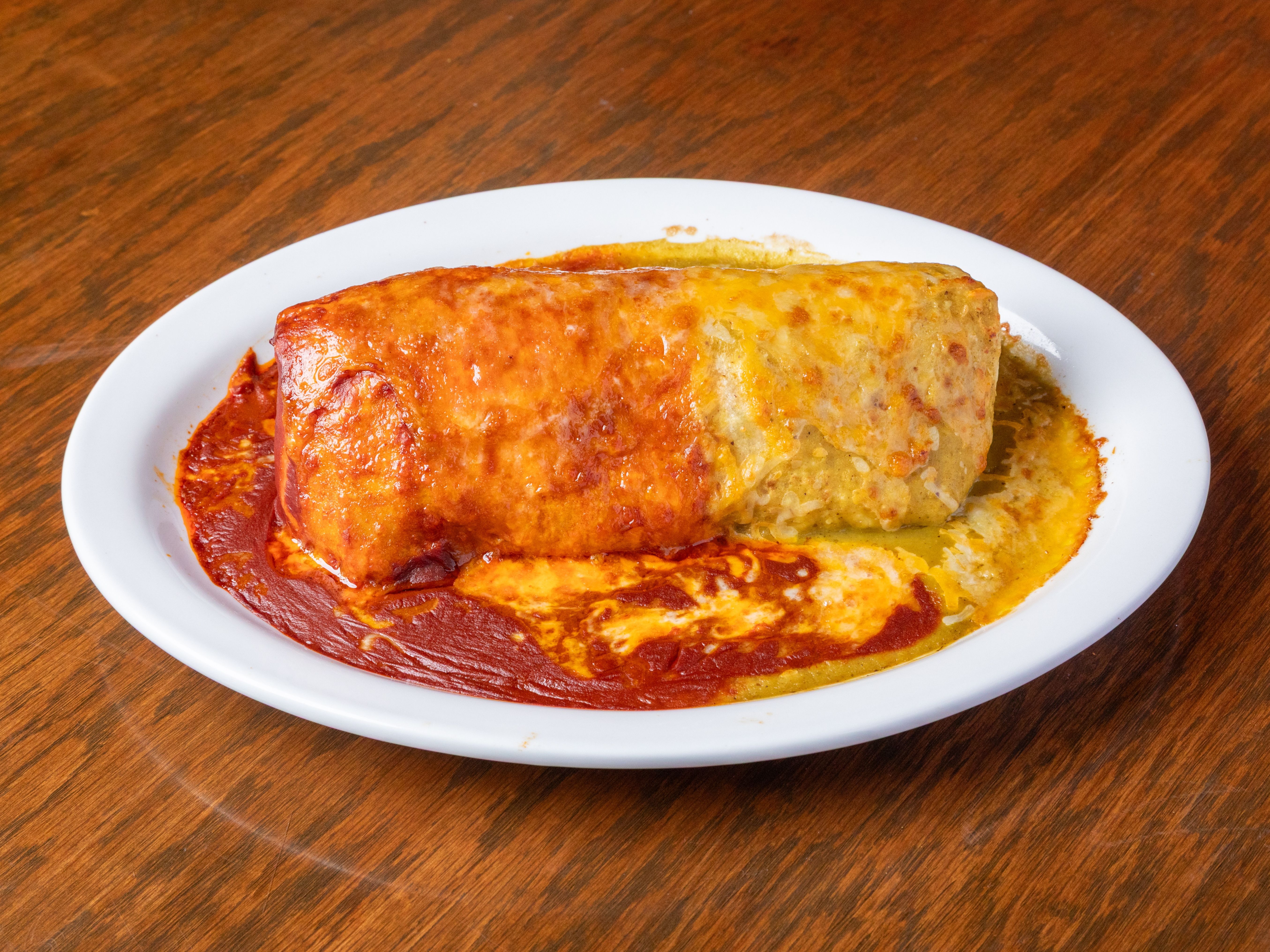 Tolteca Meat Burrito (shown wet 1/2 red sauce 1/2 green sauce).