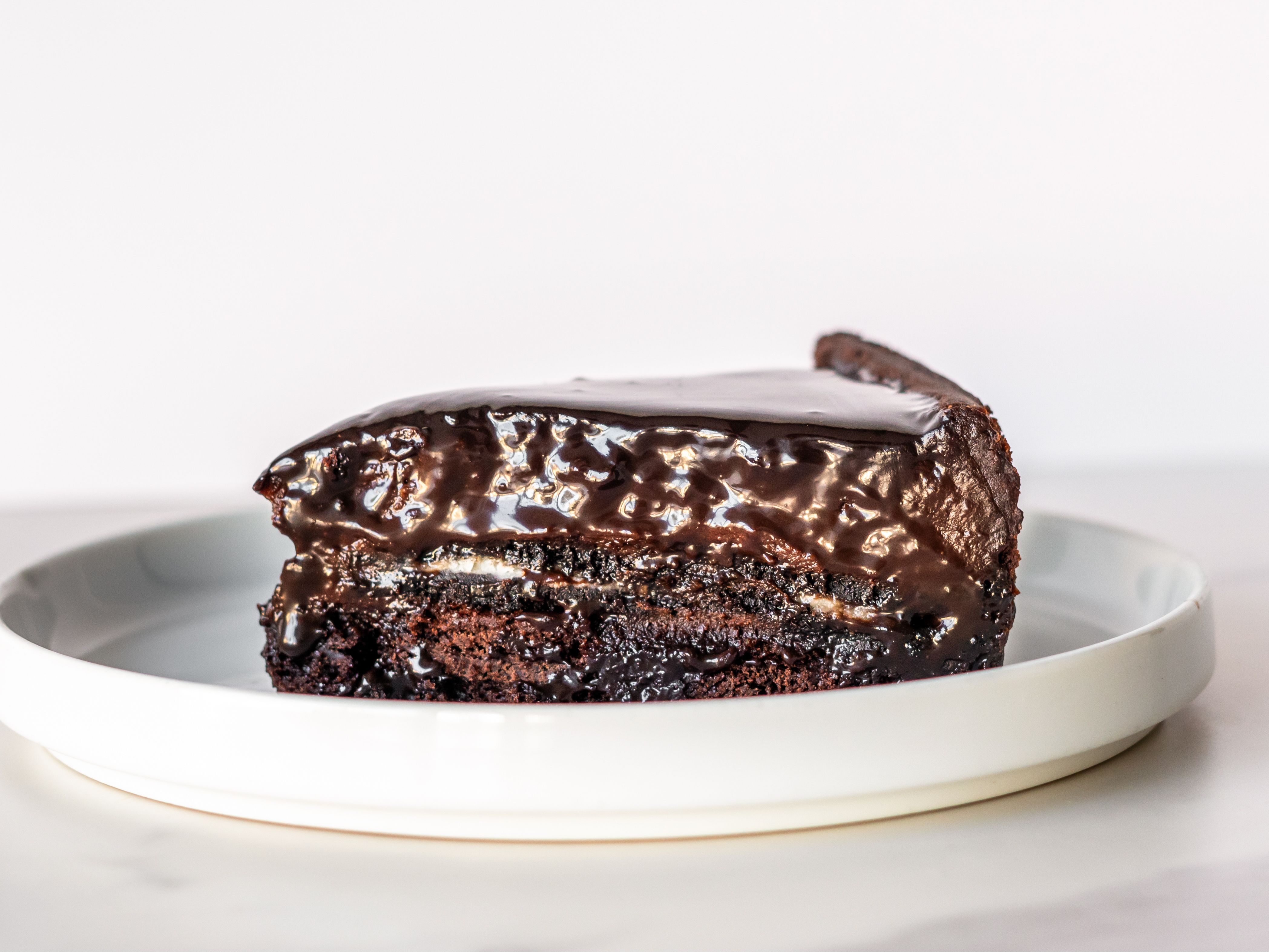 Triple Chocolate Oreo Cheesecake Slice.