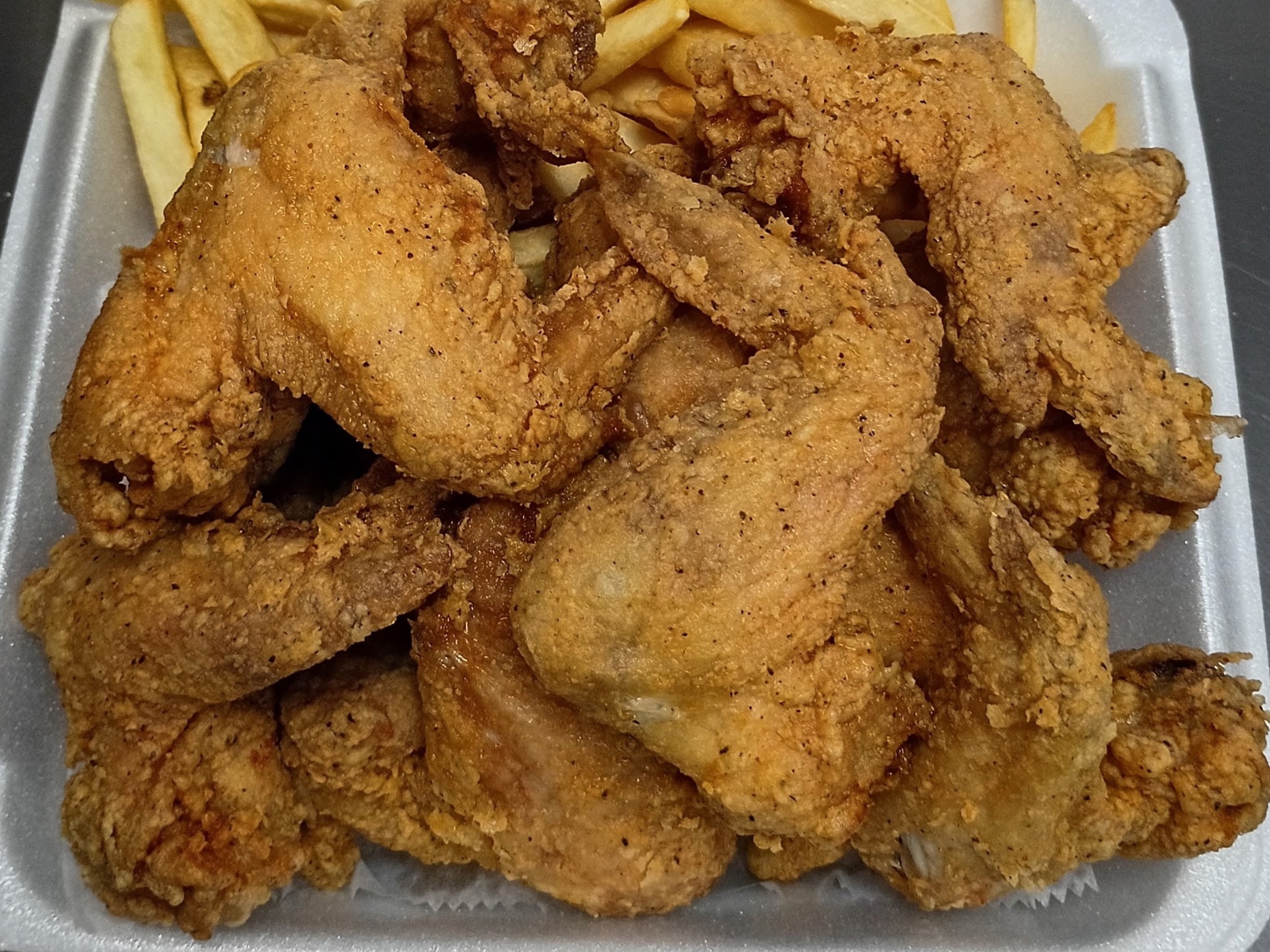 50 Whole Wings + Family Fries