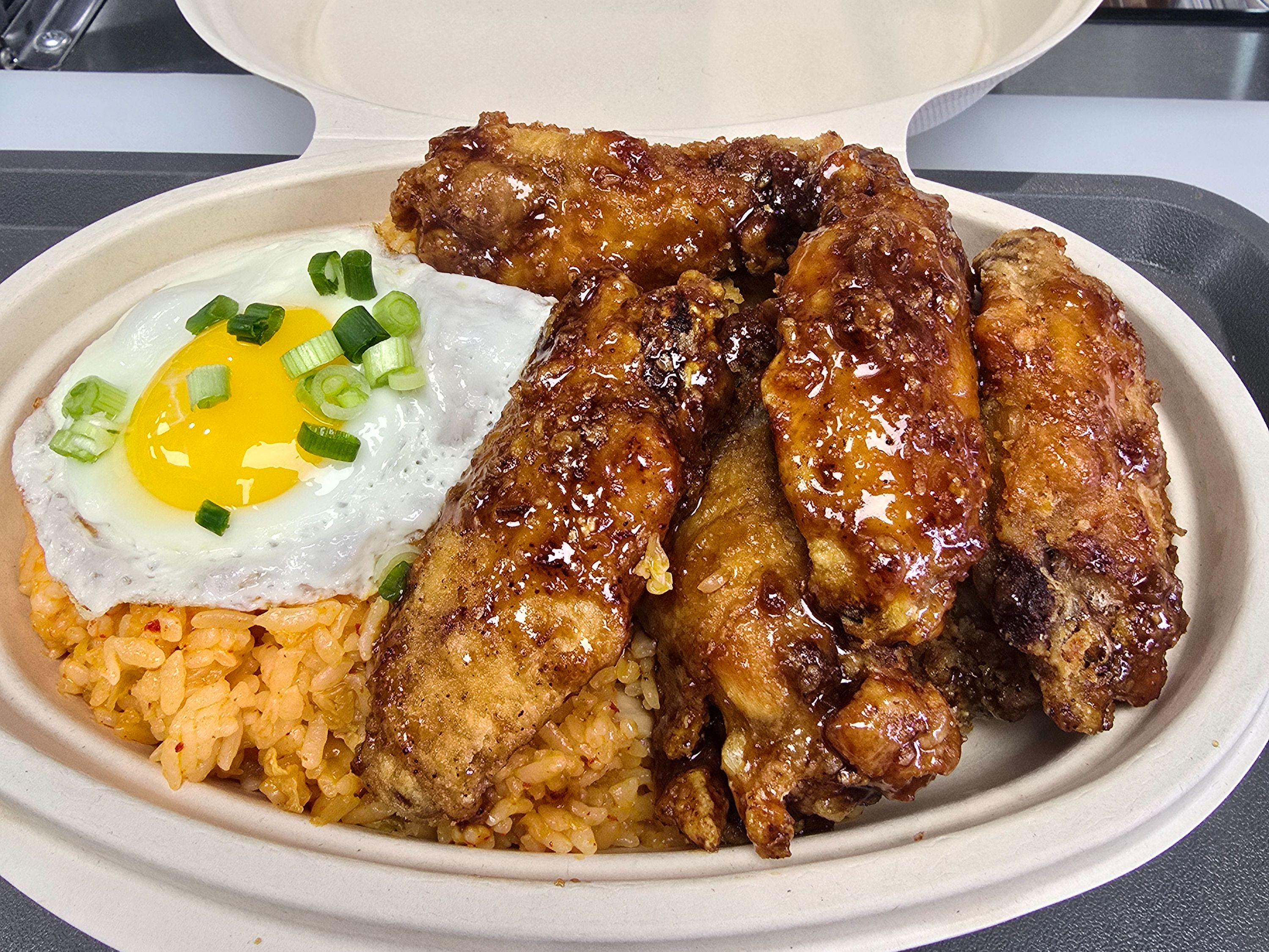 6 Pc Fried Chicken w/ One Egg Over Kimchi Rice.