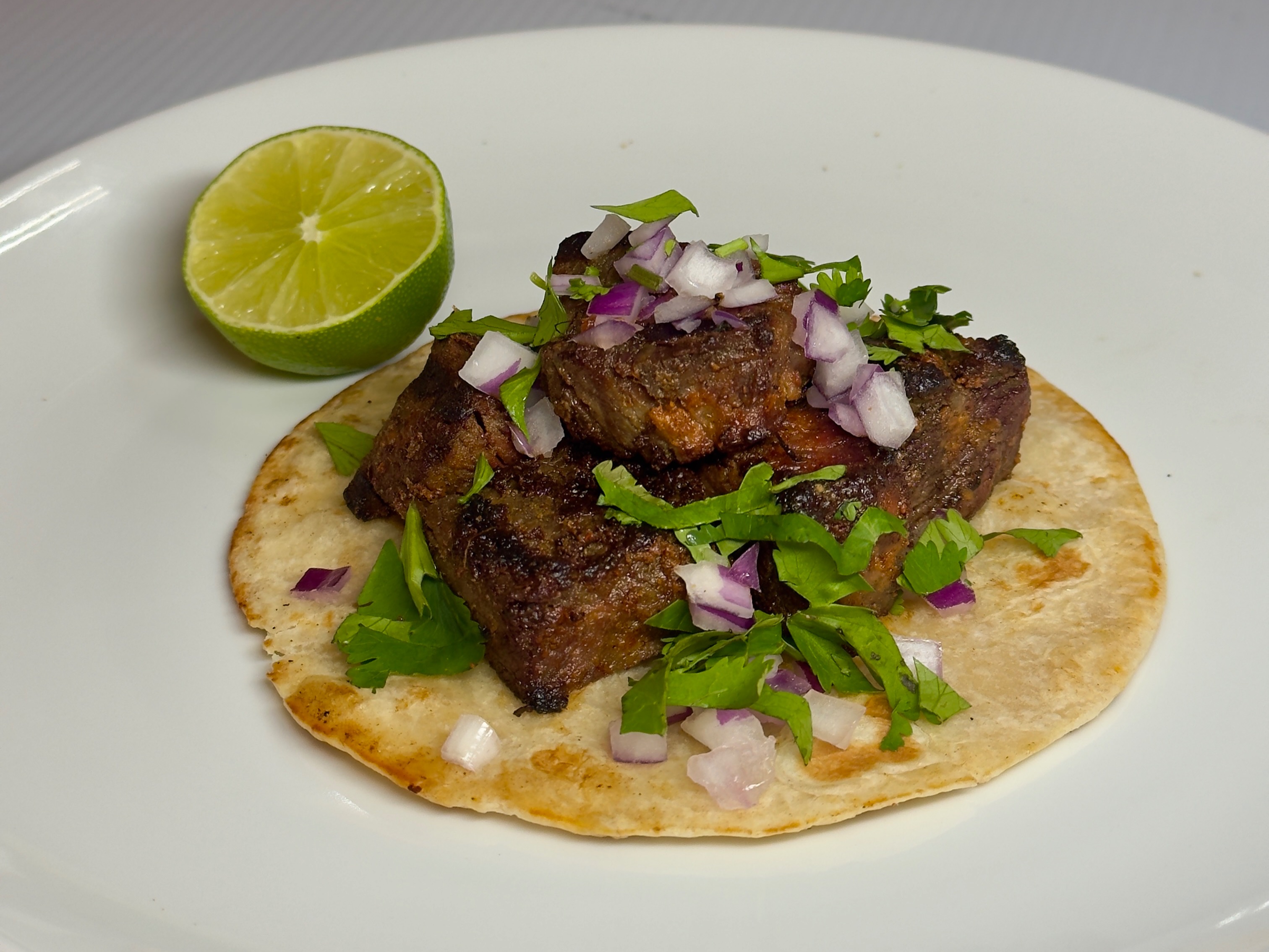 Premium Beef Tikka Boti Taco.