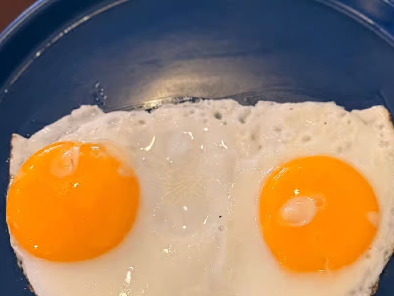 2 Huevos Fritos.