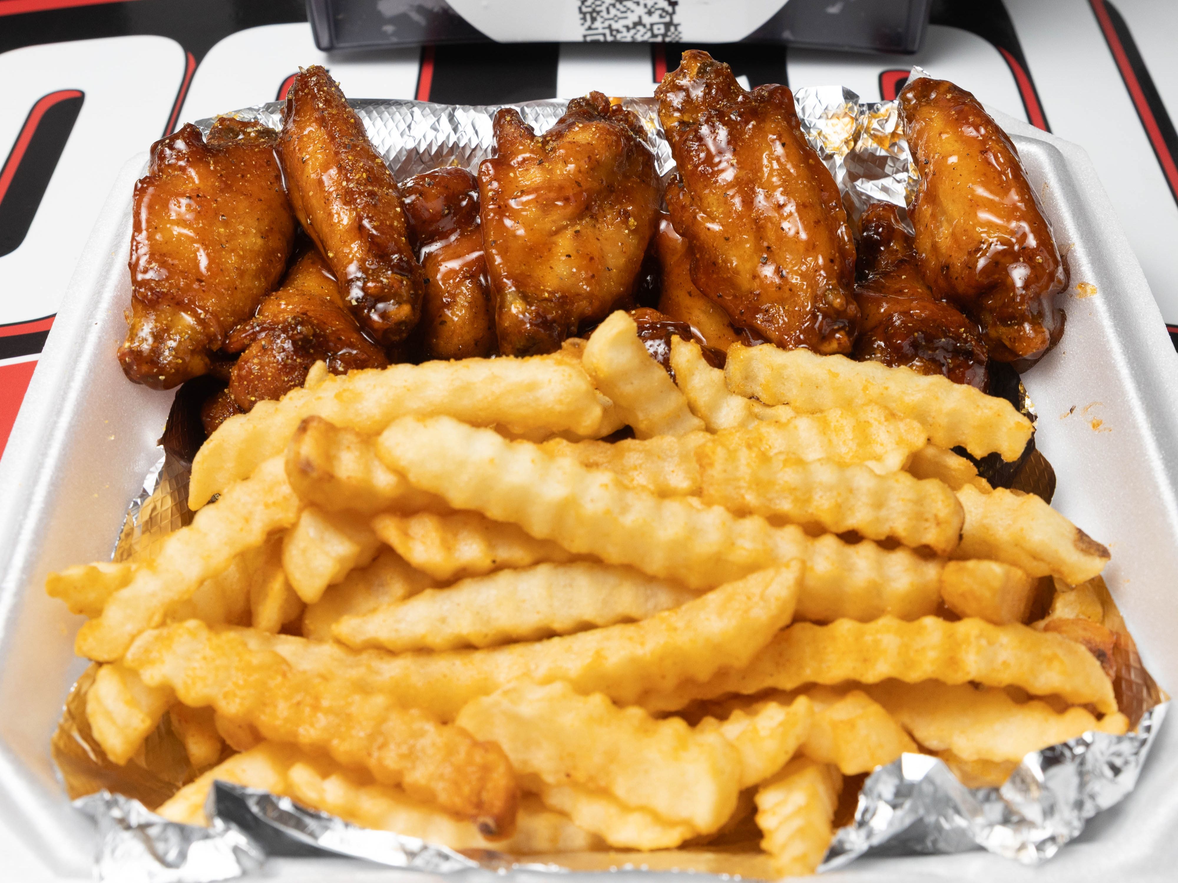 #1. Slice (1), 5 Wings, w/Fries and Drink.