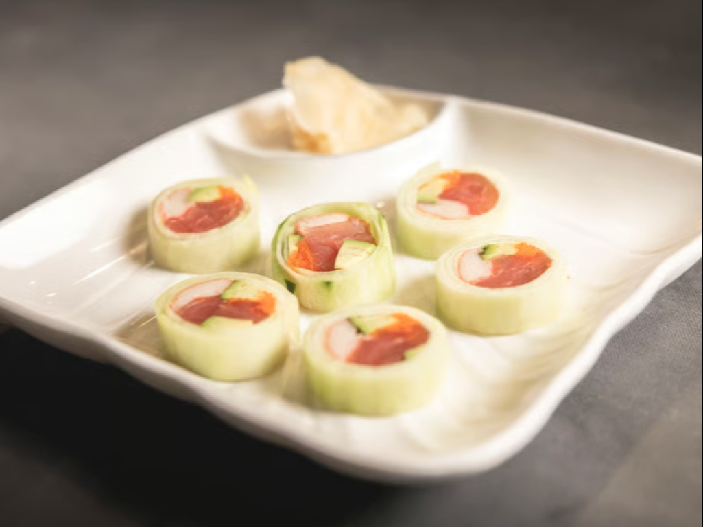 Kanisu - Tuna, crab stick, avocado with masago rolled with cucumber and served with sweet vinegar sauce.