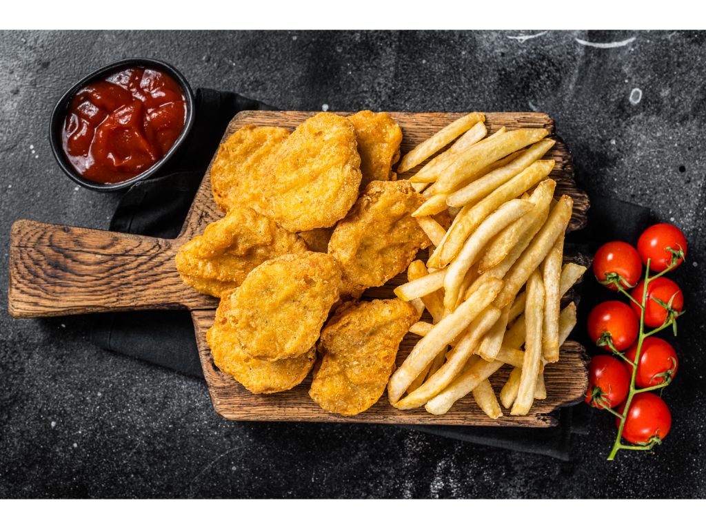 6 Chicken Nuggets And Fries.