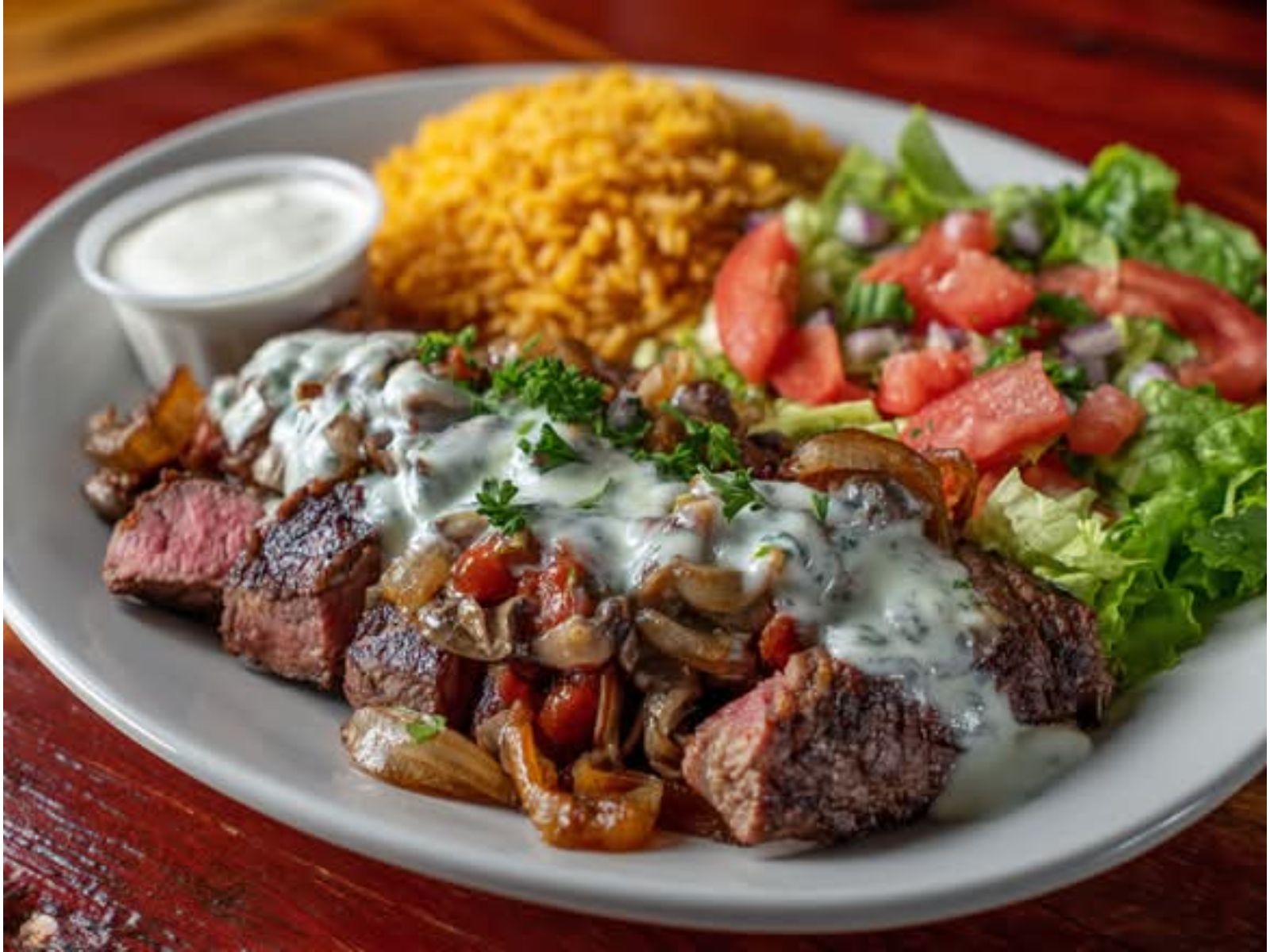 Carne Con Champinones.