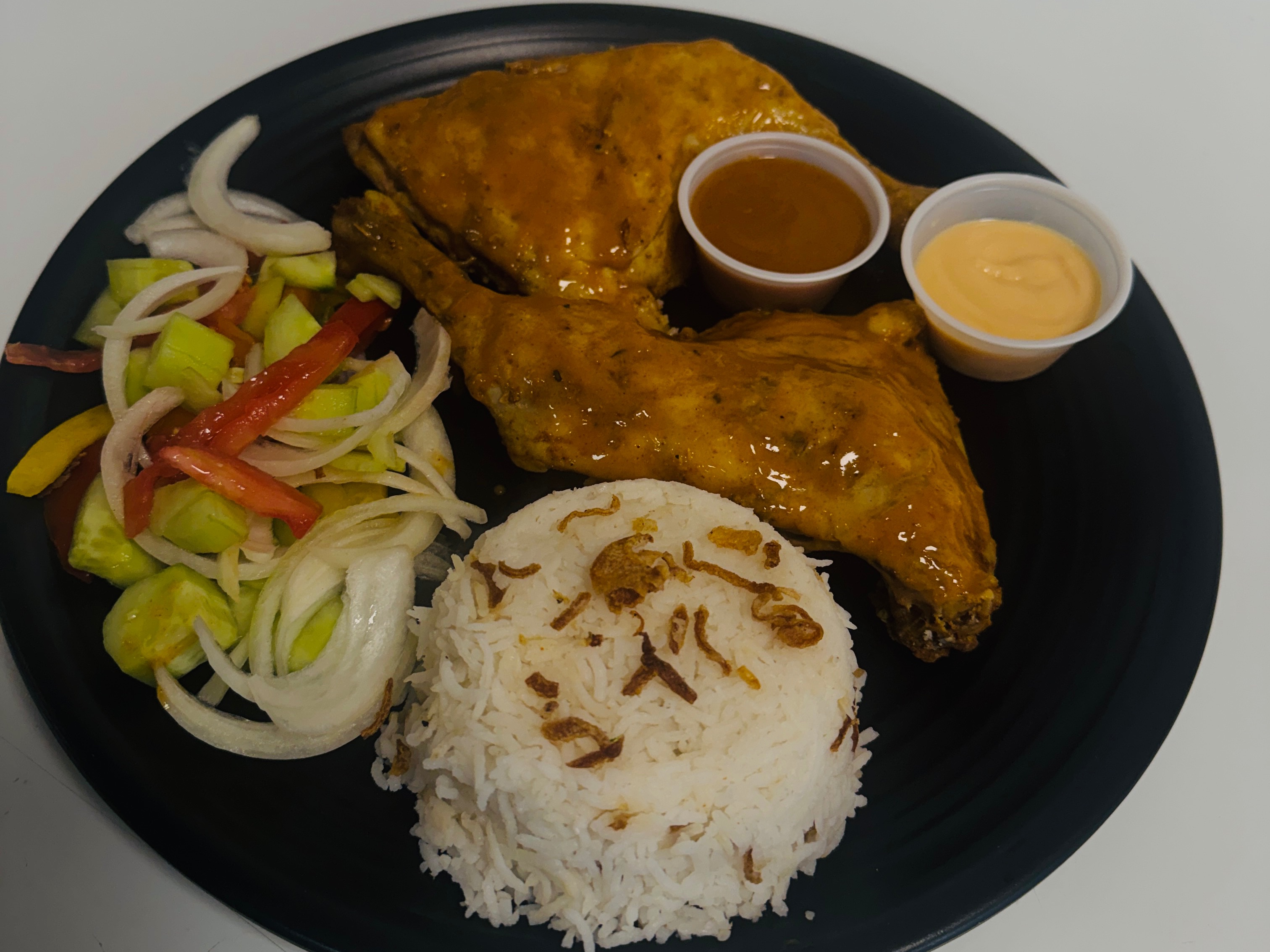 Two 1/4 Leg & Thigh (With Fries Or Rice & Sauteed Onion, Tomato, Pepper) & Choice Of Sauce (Lemon Herb/peri Peri/Mild/Hot).