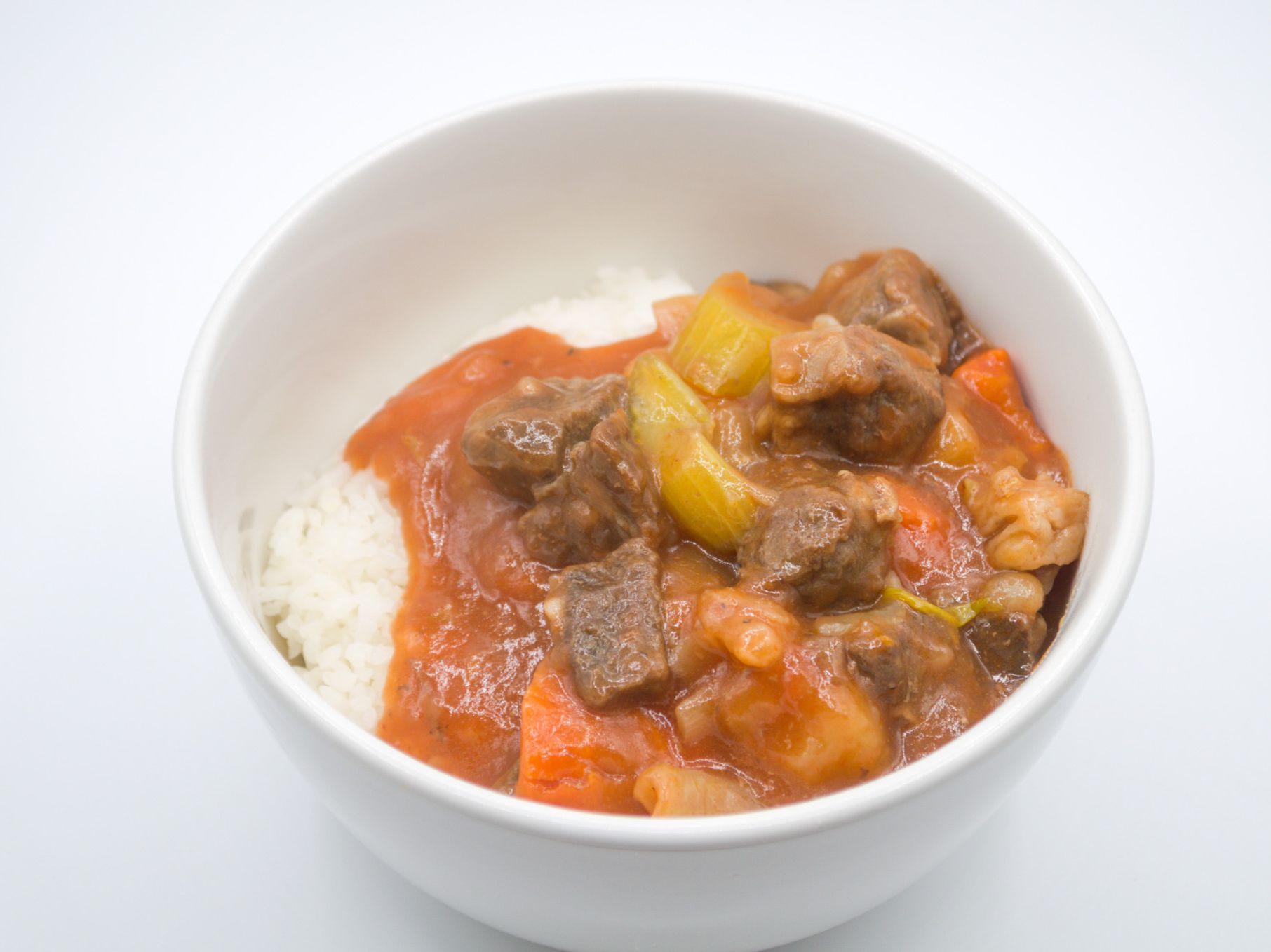 #19 Beef Stew from Yama's Fish Market — Slow-simmered chunks of beef braised with carrots, potatoes, celery, and onions in a rich tomato-based broth — hearty and full of island-style flavor. Served over white rice.