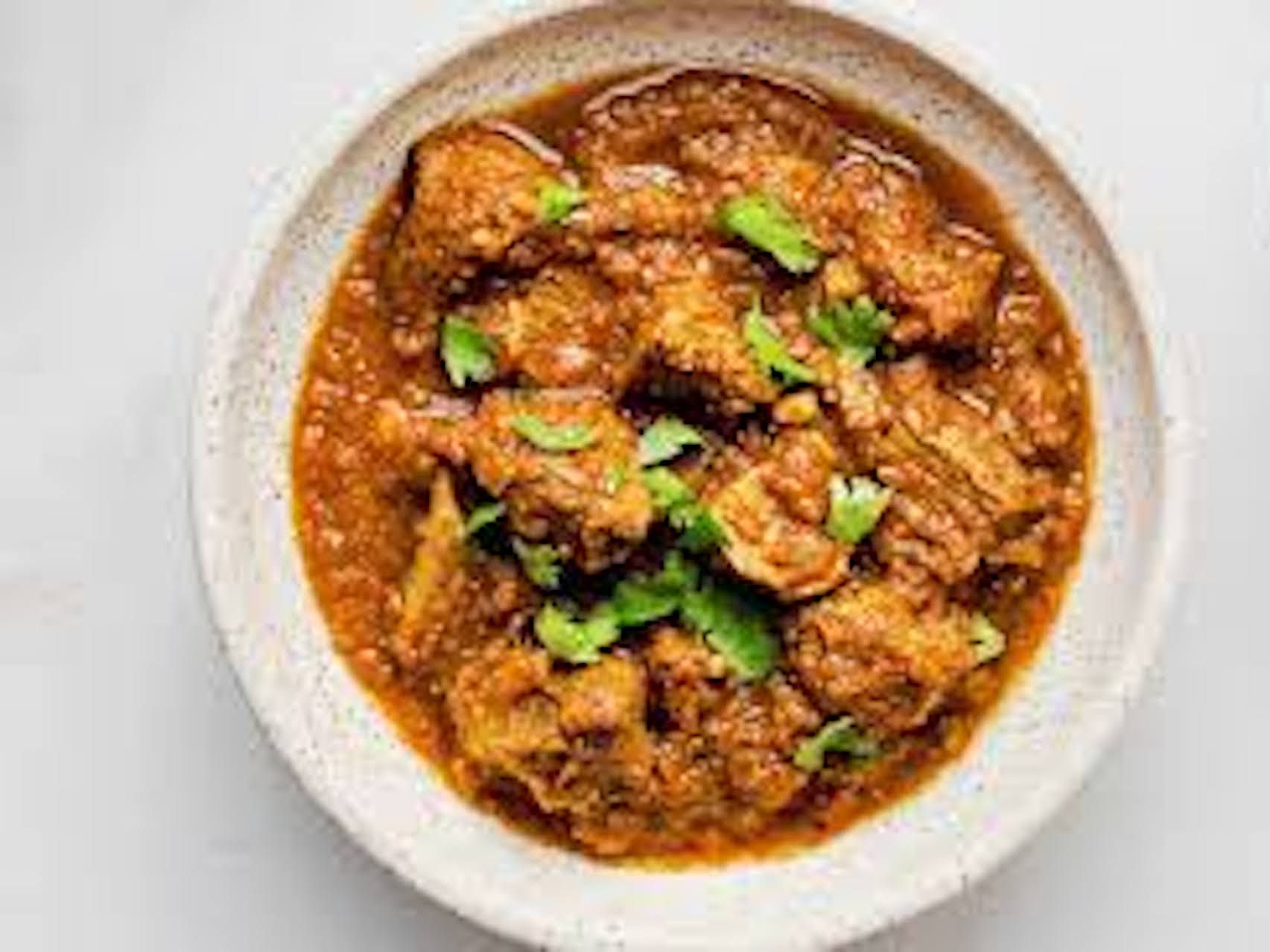 GOAT CURRY (bone in).