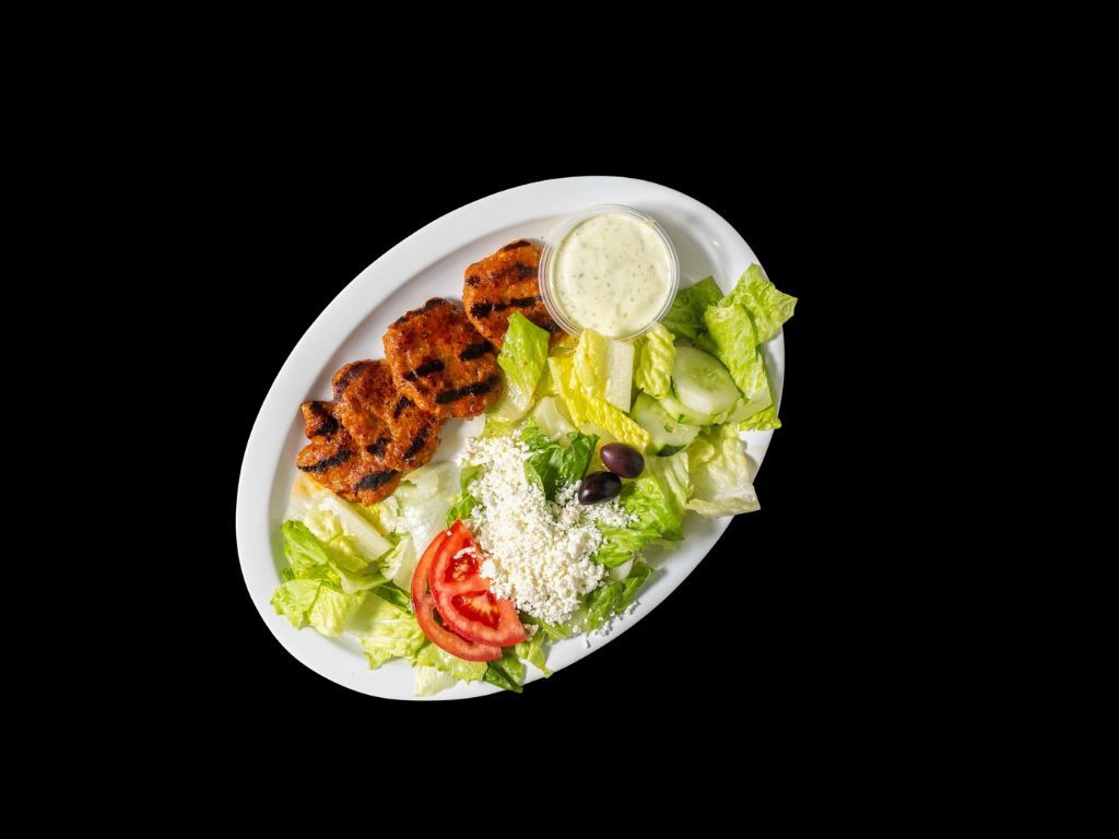 Chicken Kofte (4 Pieces) Over Salad.
