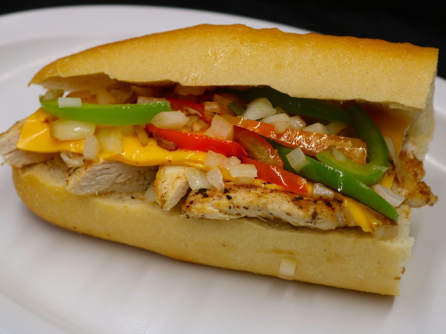 Half Chicken Cheesesteak.