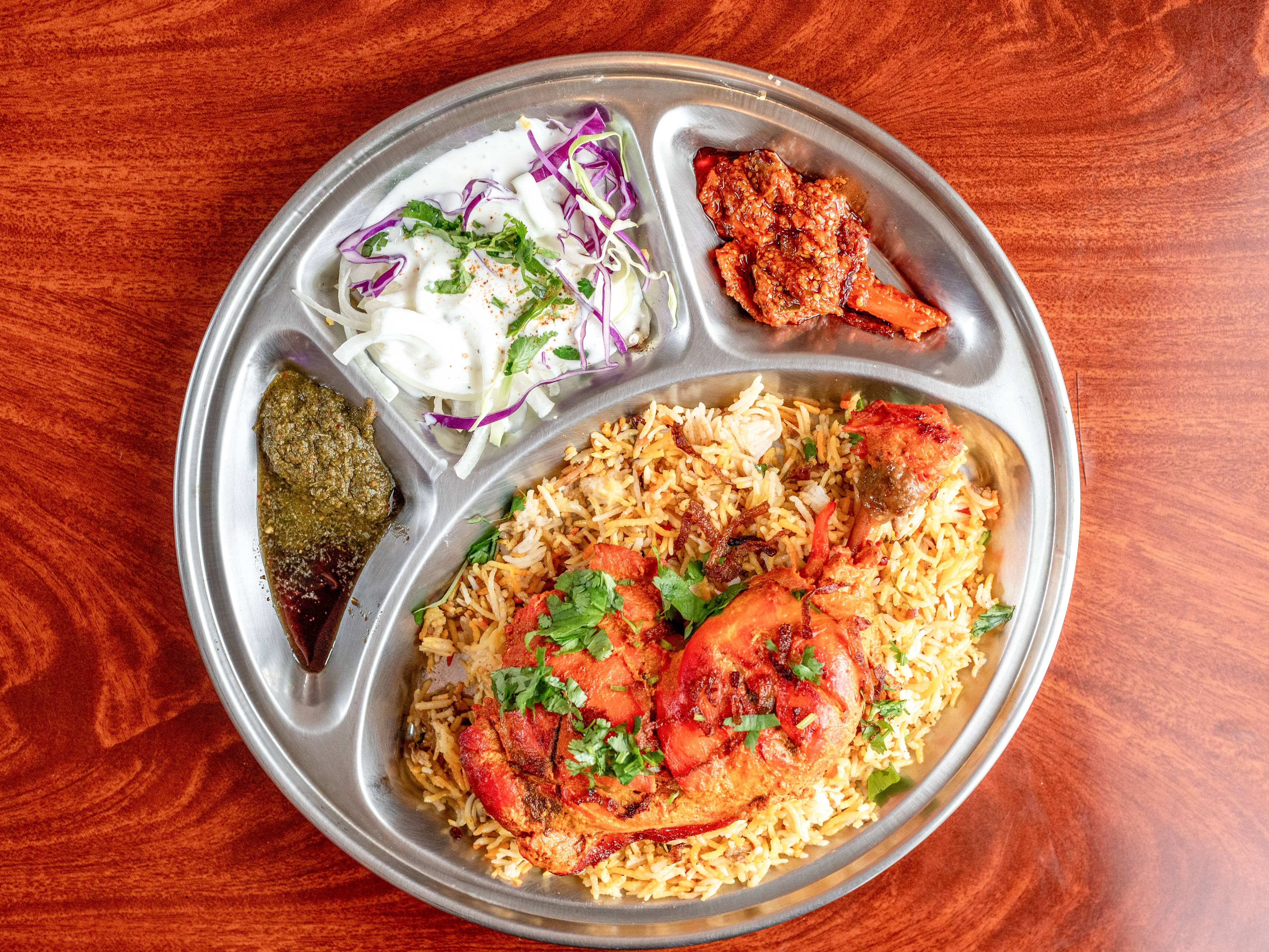 Chicken Biryani With Steam Roast Chicken Leg Qtr.