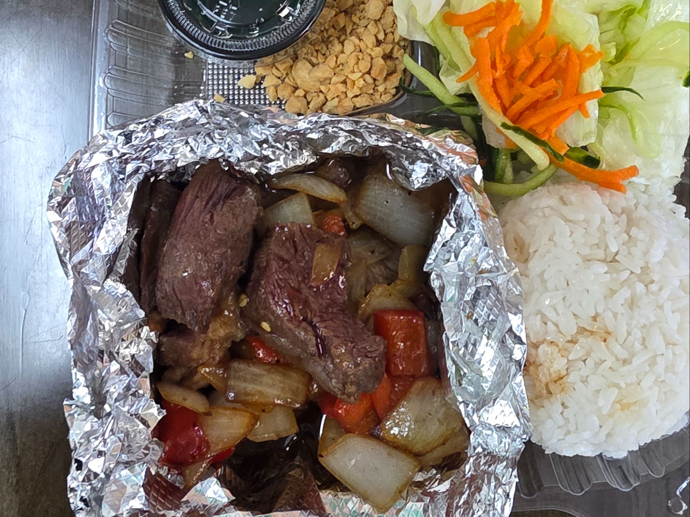 R12 Shaking Beef Over Rice.