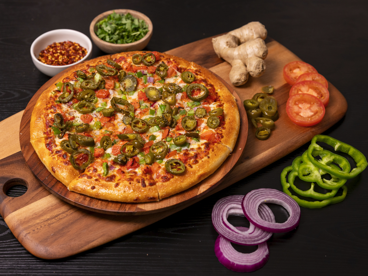 Butter Paneer Masala Pizza.