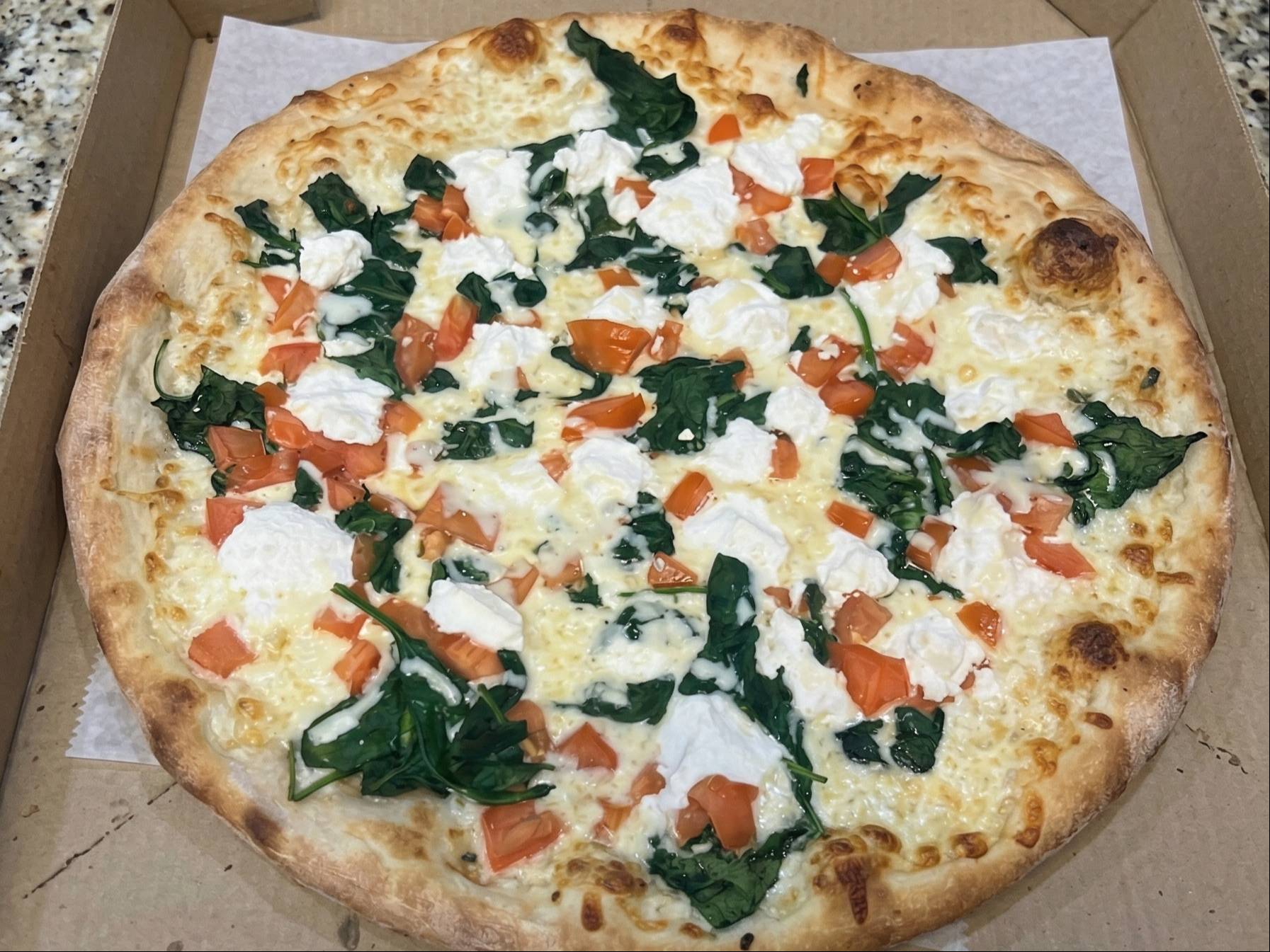Spinach, Ricotta and Tomato Pizza.