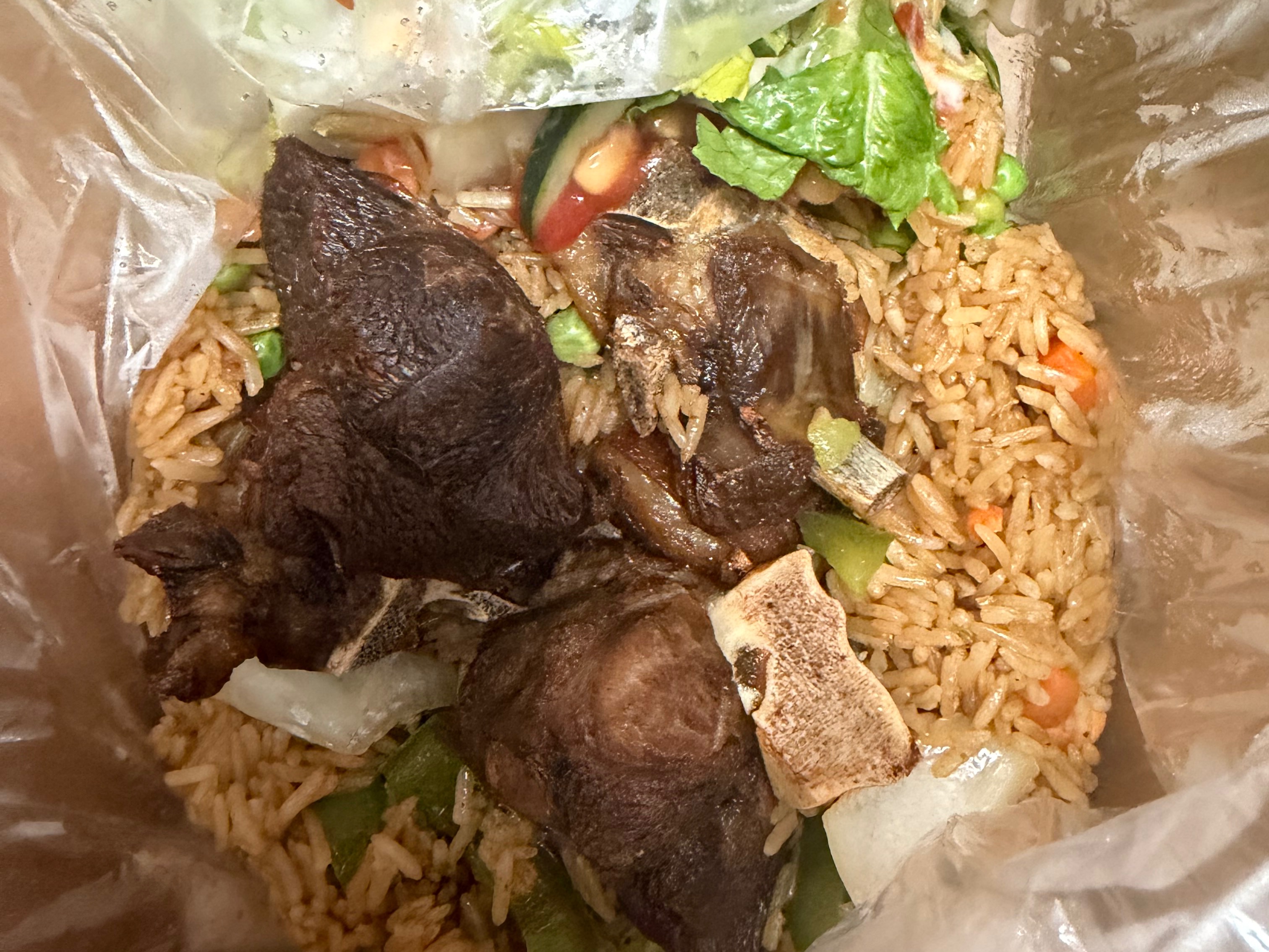 Check check Fried Rice W Goat.