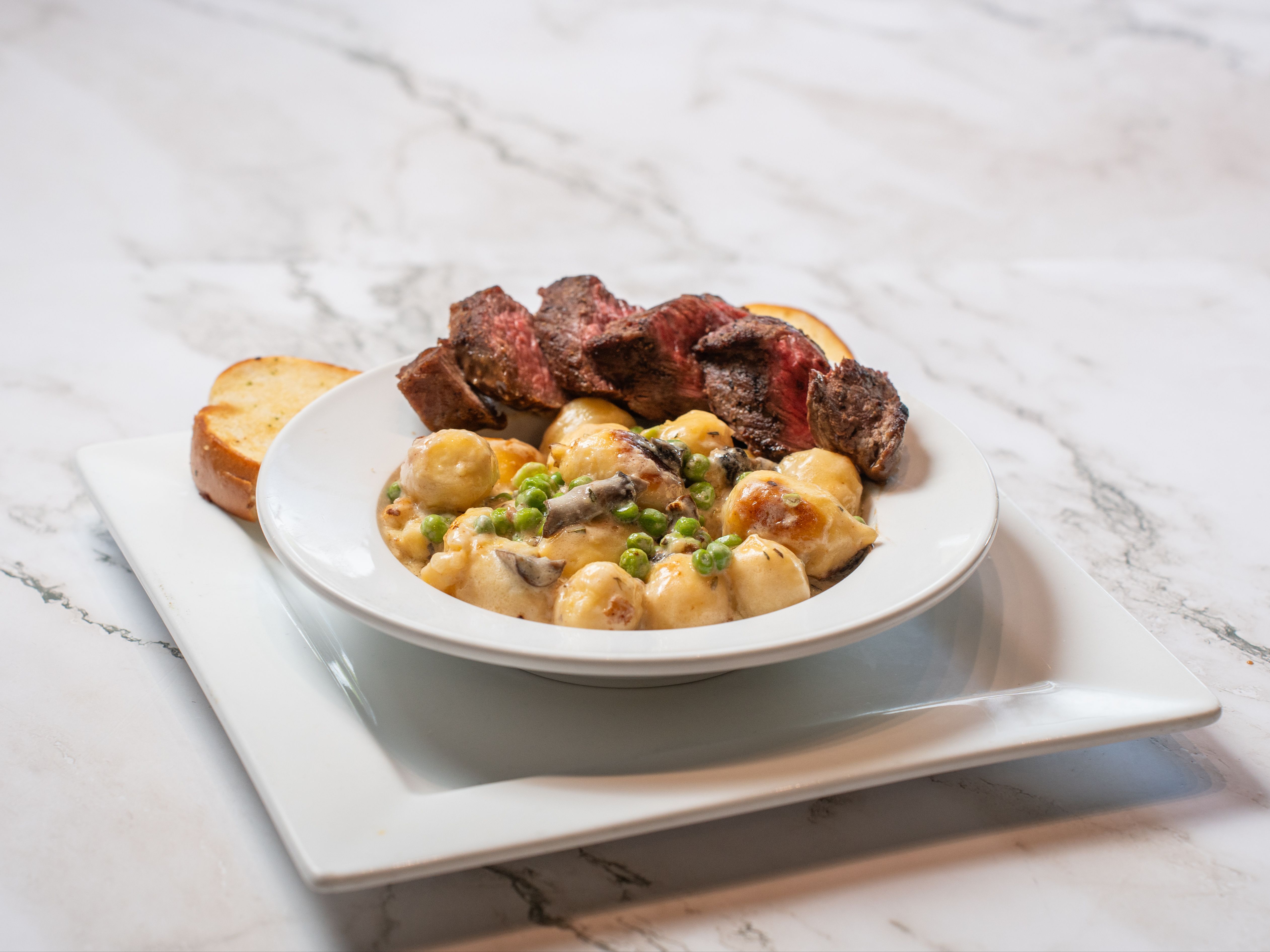 Petite Tenderloin served with Asiago Stuffed Gnocchi