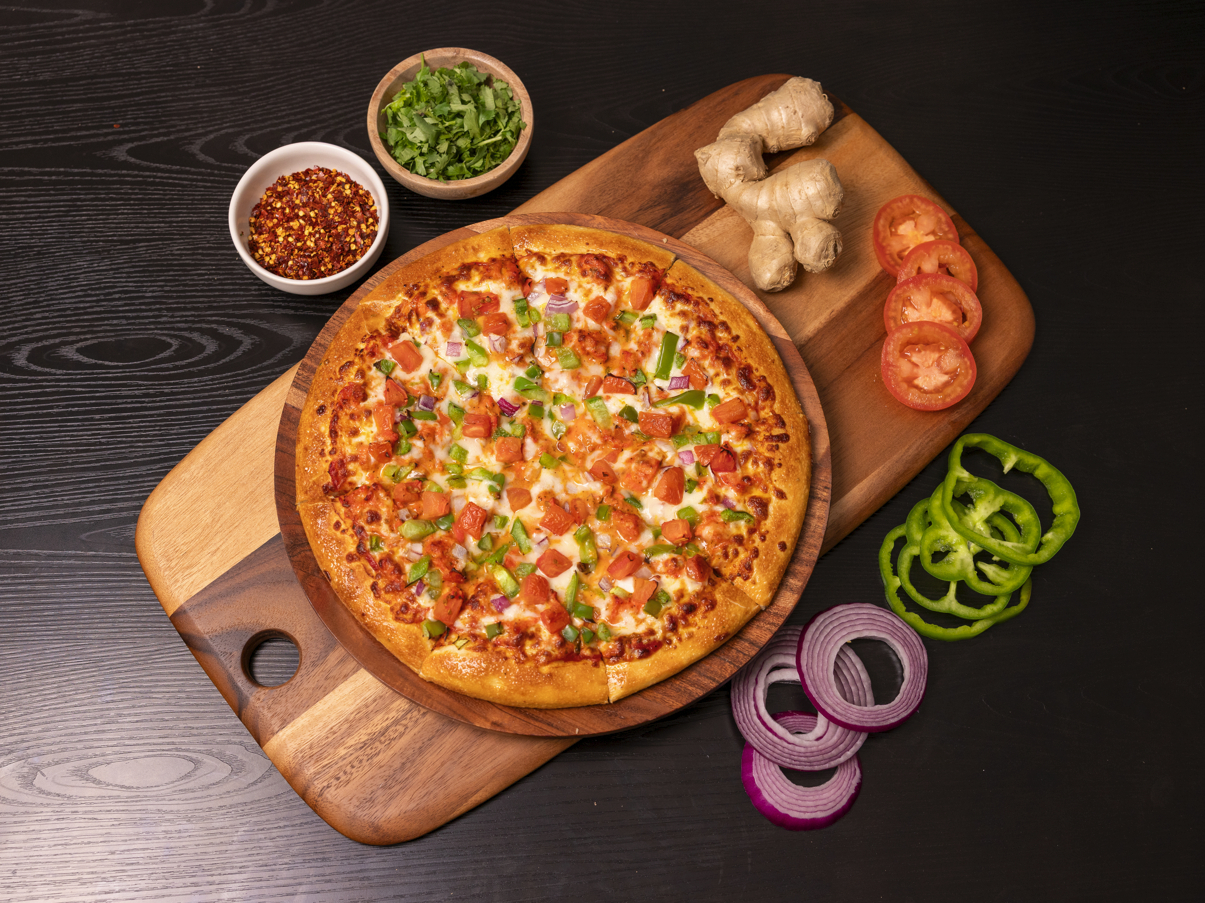 Butter Chicken Pizza.