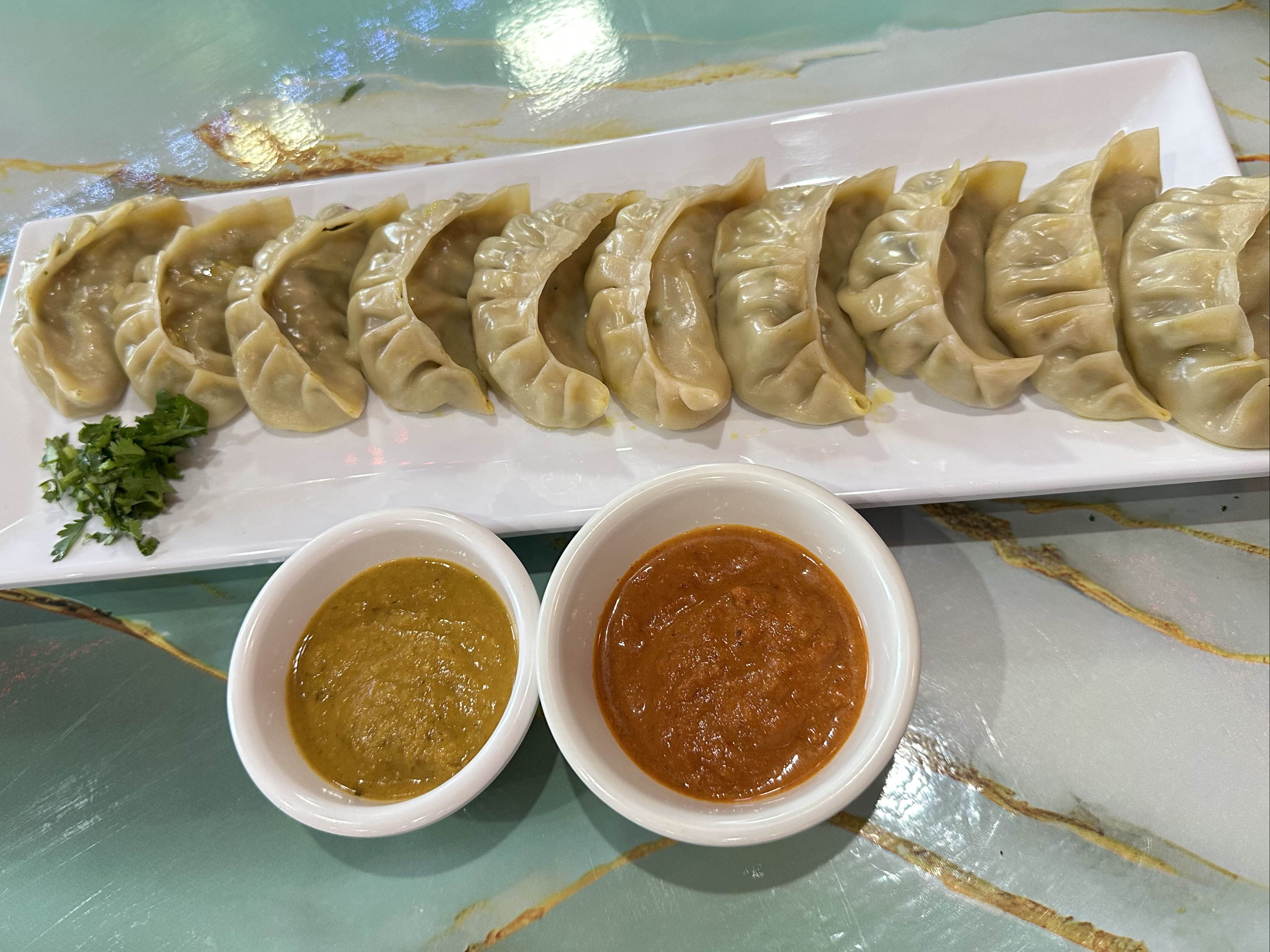 KOTHE GOAT MOMO (Pan Fried).