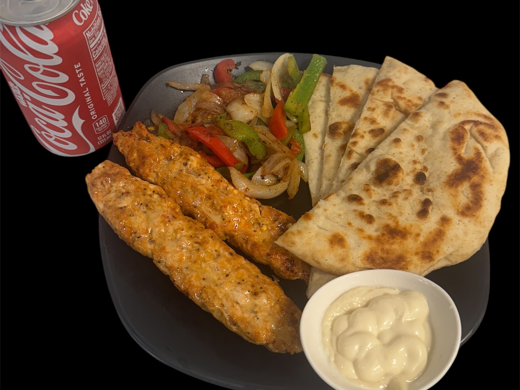 Chicken Kabab Lunch Combo( 2pieces Of Seekh Kabab With Flavoured Basmati Rice,Pita Bread,Sauted Vegi, Garlic Dip,12oz Soda Can).