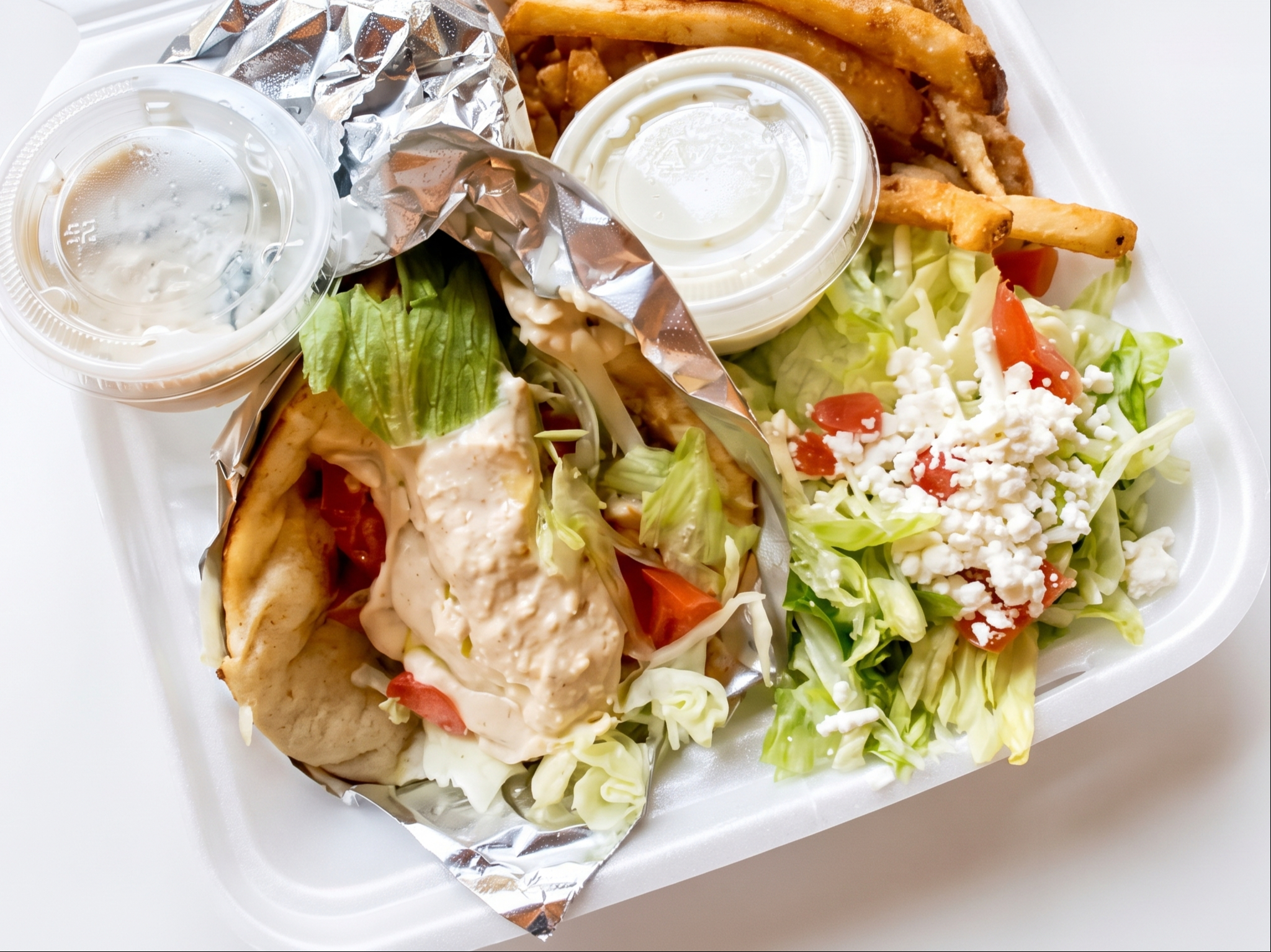 Chicken on Pita with Hummus (with a bag of chips).