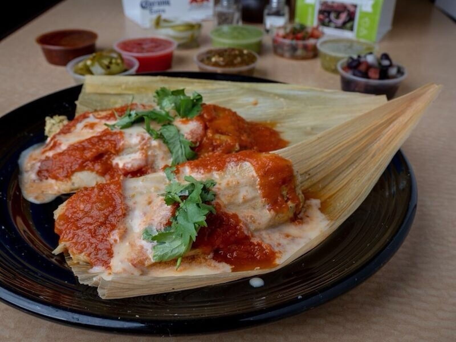 2 Smothered Tamales.