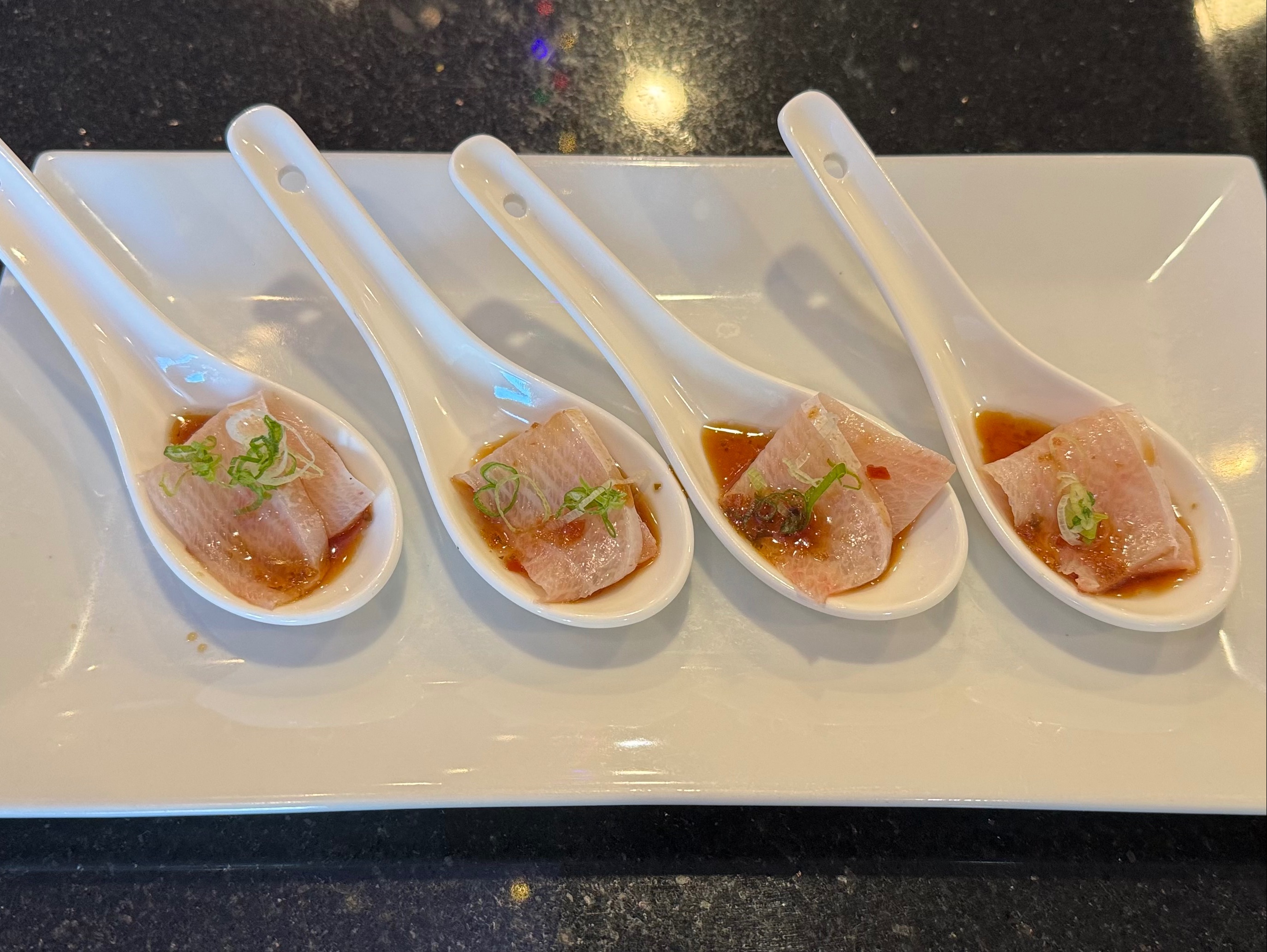 Yellowtail Carpaccio*.
