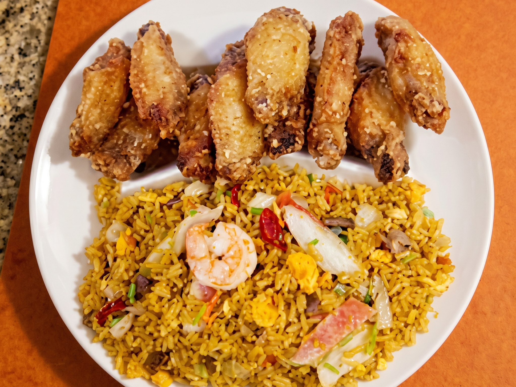 10 Piece Chicken Wing With Shrimp Fried Rice.