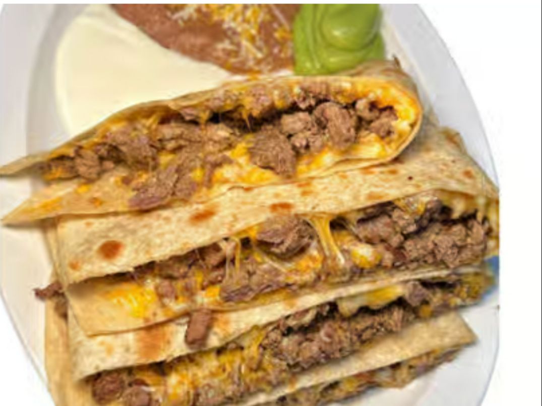 Al Pastor Super Quesadilla.
