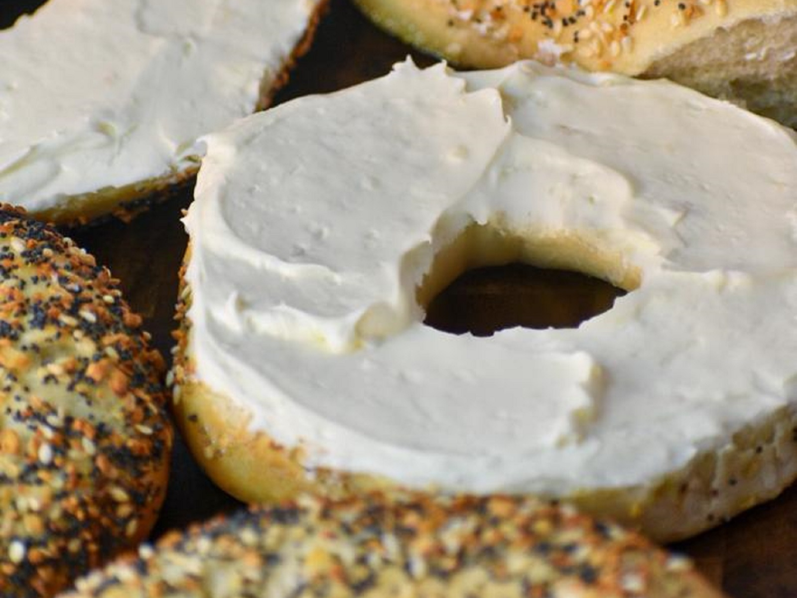 BAGEL W/ CREAM CHEESE & BUTTER (both sides).