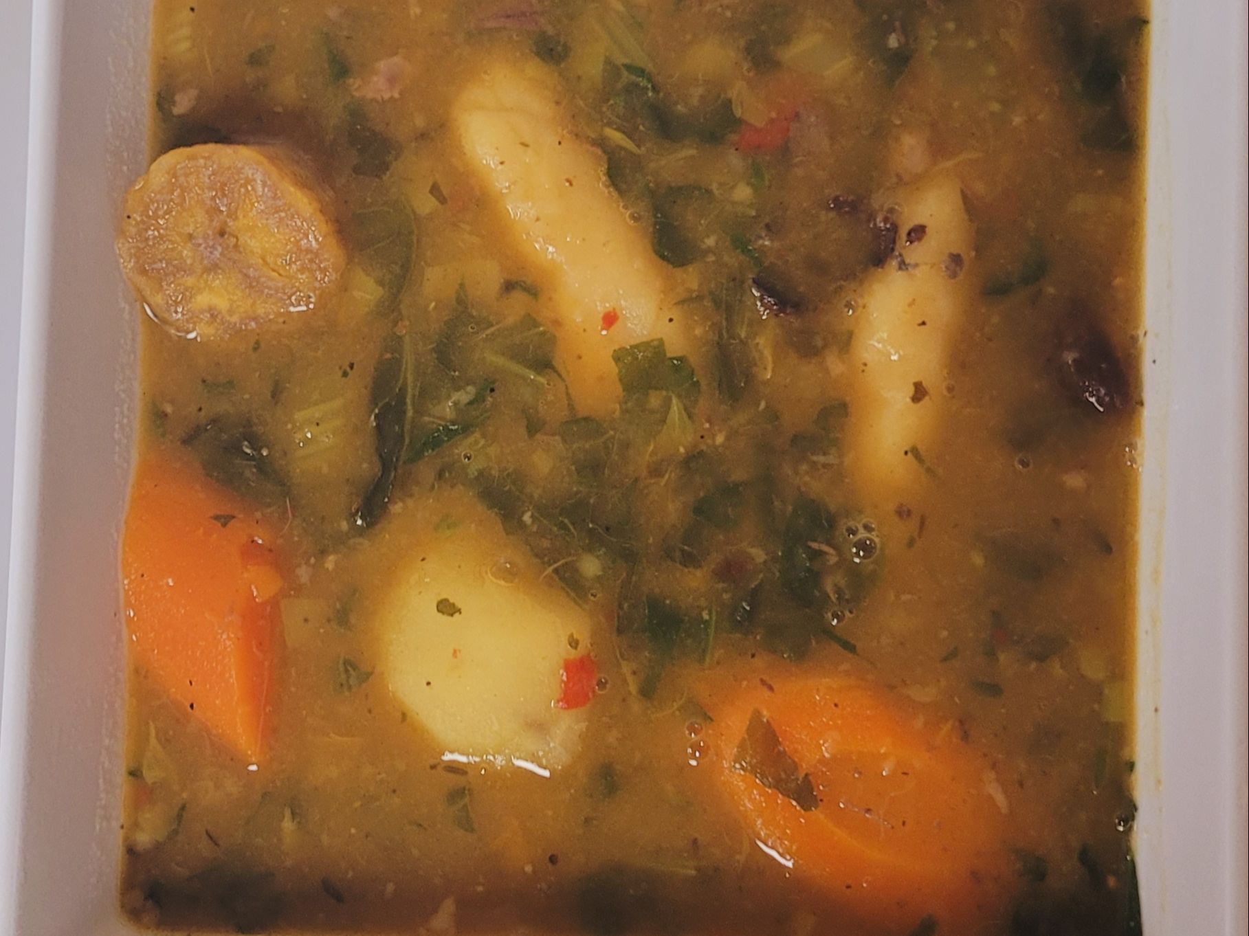 BOUILLON CABRIT. (soup w/ Goat meat).